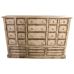 Commode ancienne en bois polychrome blanc avec tiroirs