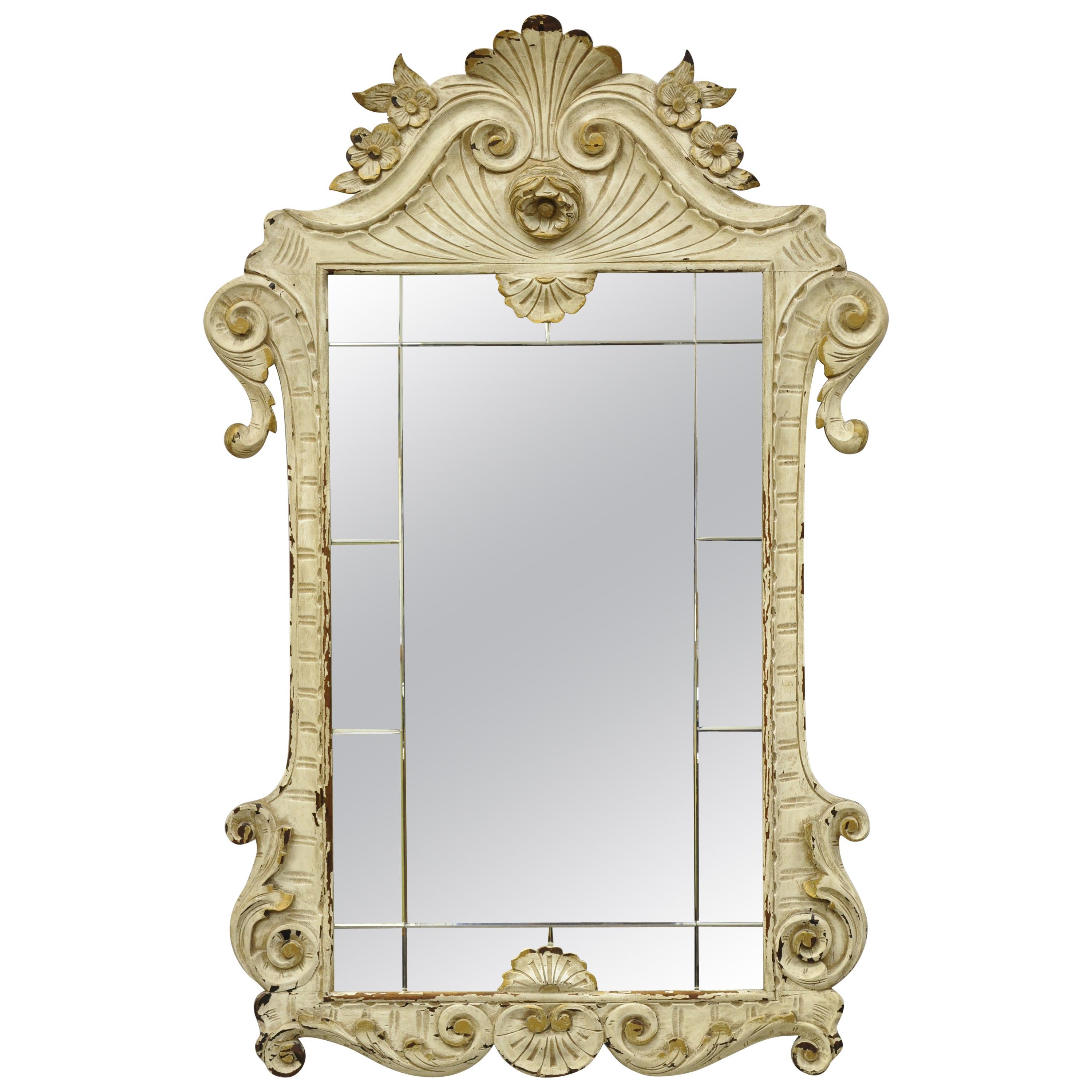 Antique white shabby distress painted chic rose carved Victorian wall mirror. Item features an etched mirror, rose and shell carved solid wood frame, distressed white finish, very nice antique item, great style and form, circa early 1900s.