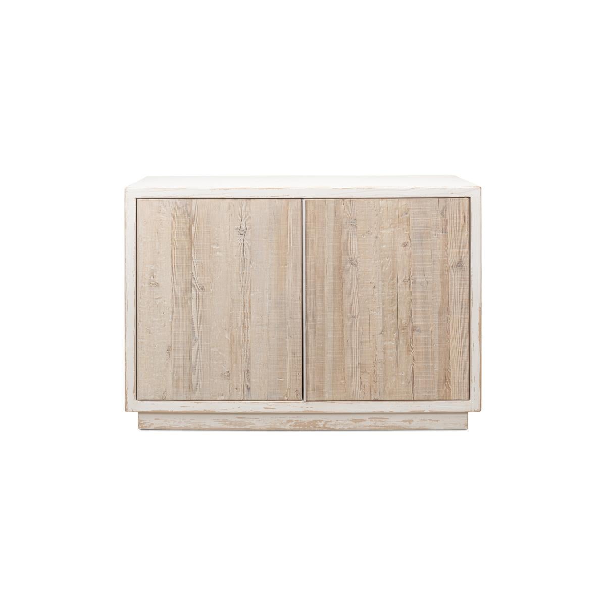 The antiqued white pine wood, paired with weathered finish doors, creates a statement piece. Raised on a square plinth base, this cabinet effortlessly blends tradition with contemporary design.

Dimensions: 50