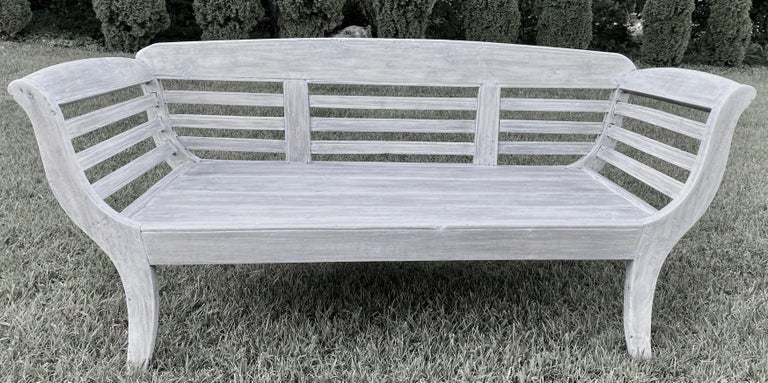 Colonial influenced antique hand-carved rustic country daybed or bench made from natural aged teak, deep enough for sleeping or relaxing. Suitable for indoor or outdoor use. Great in the garden, on a porch or patio. The antique teakwood bench sofa