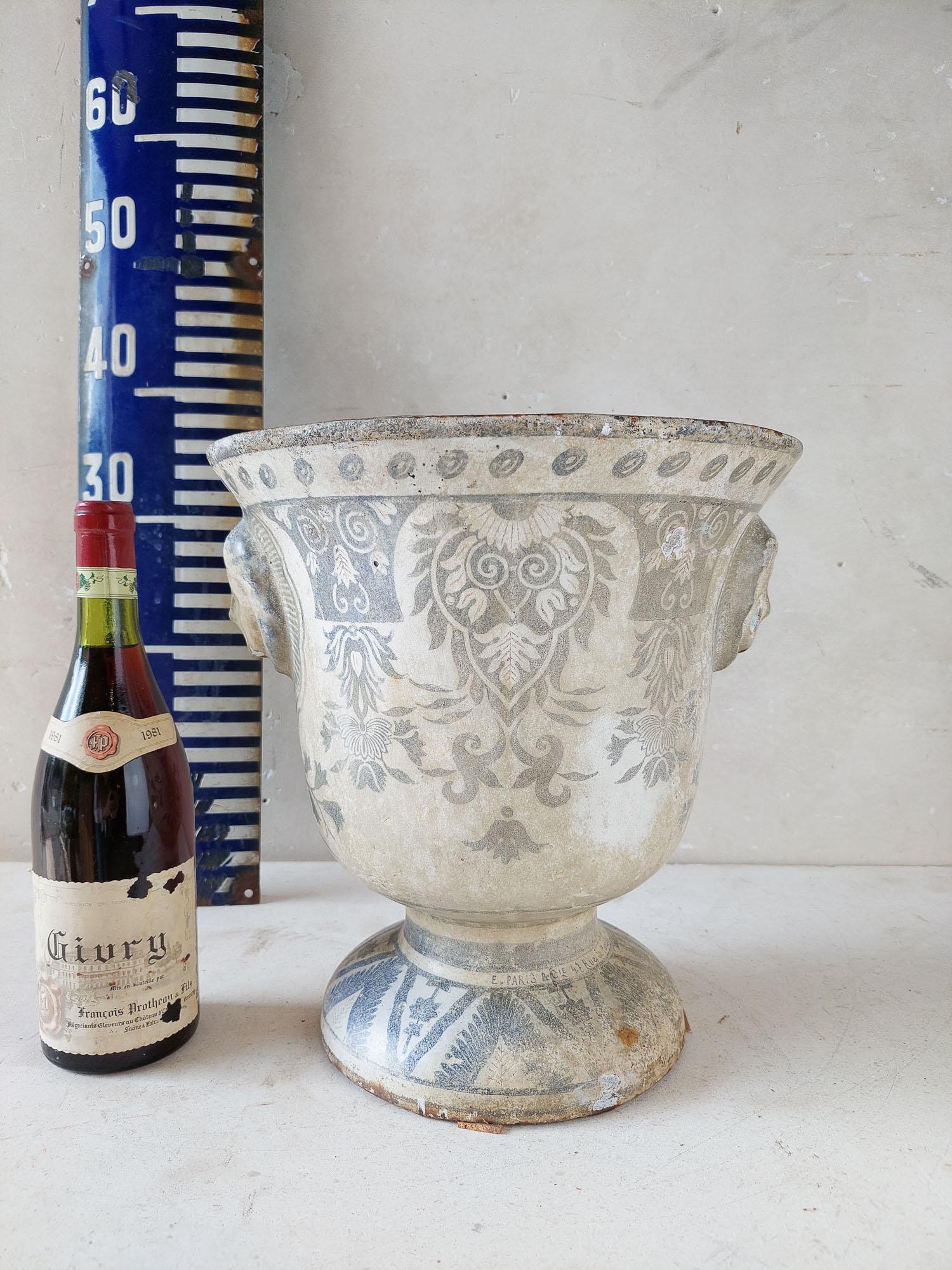 Cast Antique white with blue enamel cast iron Paris en Cie vase For Sale