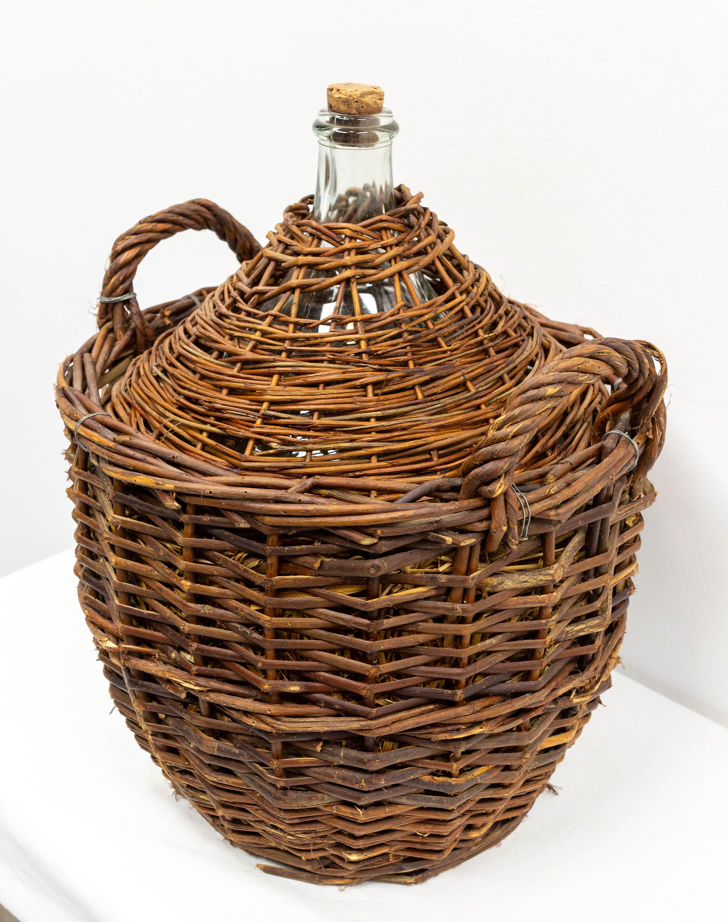 French Provincial Antique Whiteglass Bottle Demijohns or Carboy in Authentic Wicker Basket, France For Sale
