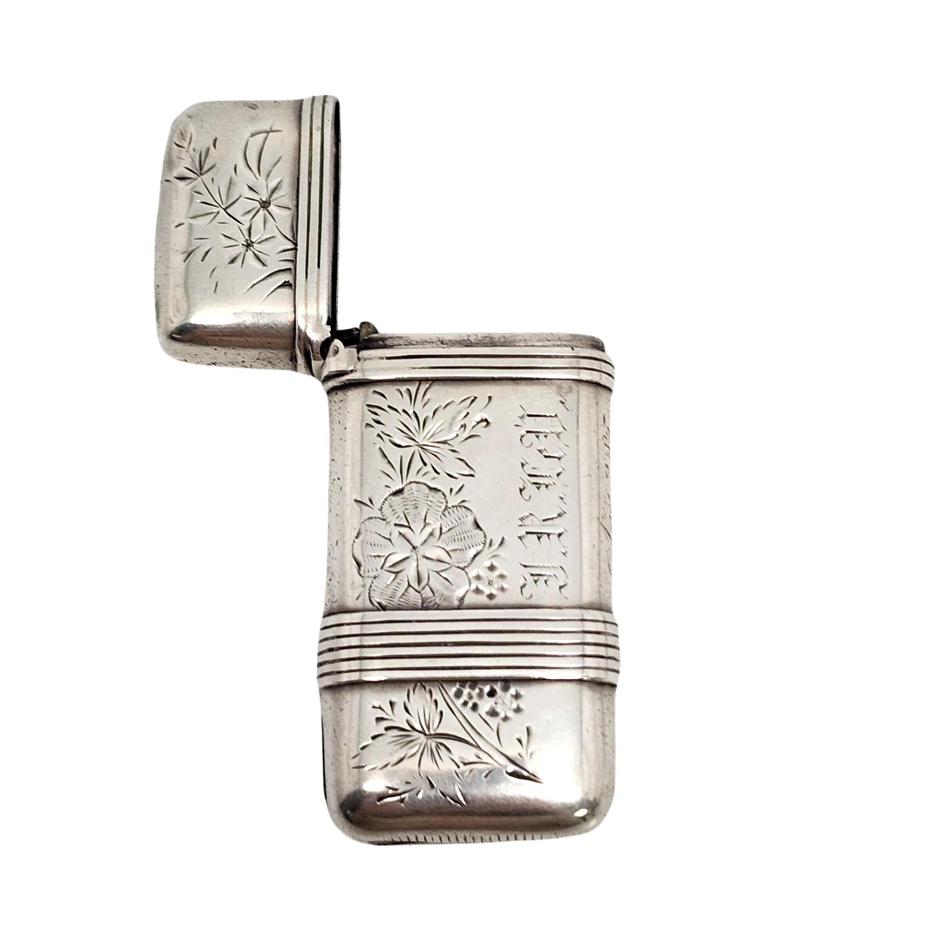 Antique sterling silver match safe/vesta case by Whiting Mfg Co with engraving.

Engraved with name and date which appears to be J.R.CeV (lettering is hard to decipher), Nov 3 '85

This beautiful piece features an etched design of flowers. It has a