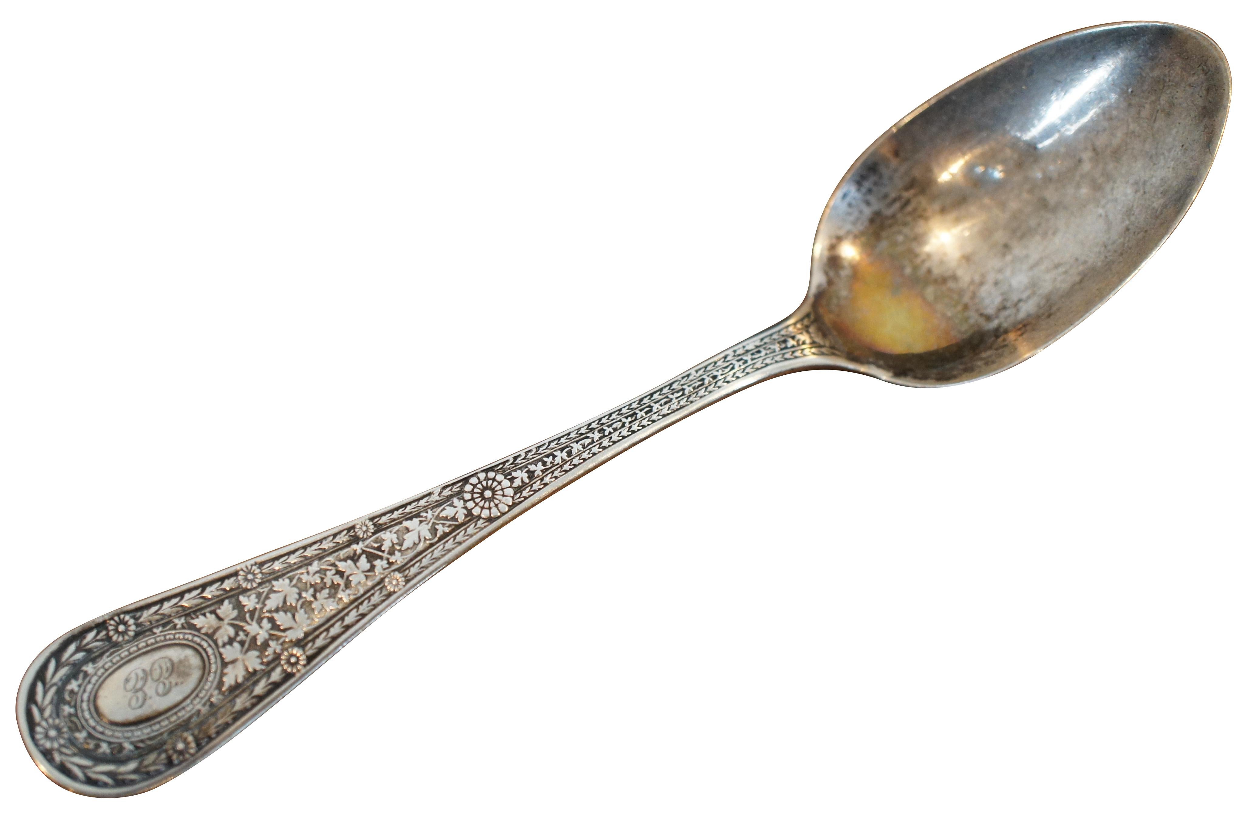 Mid 19th century Whiting sterling silver spoon decorated in the Laureate pattern (introduced 1890) of daisies and vining leaves, monogrammed with the initials “EE.” Marked / originally purchased from Mermod, Jaccard & Co.

