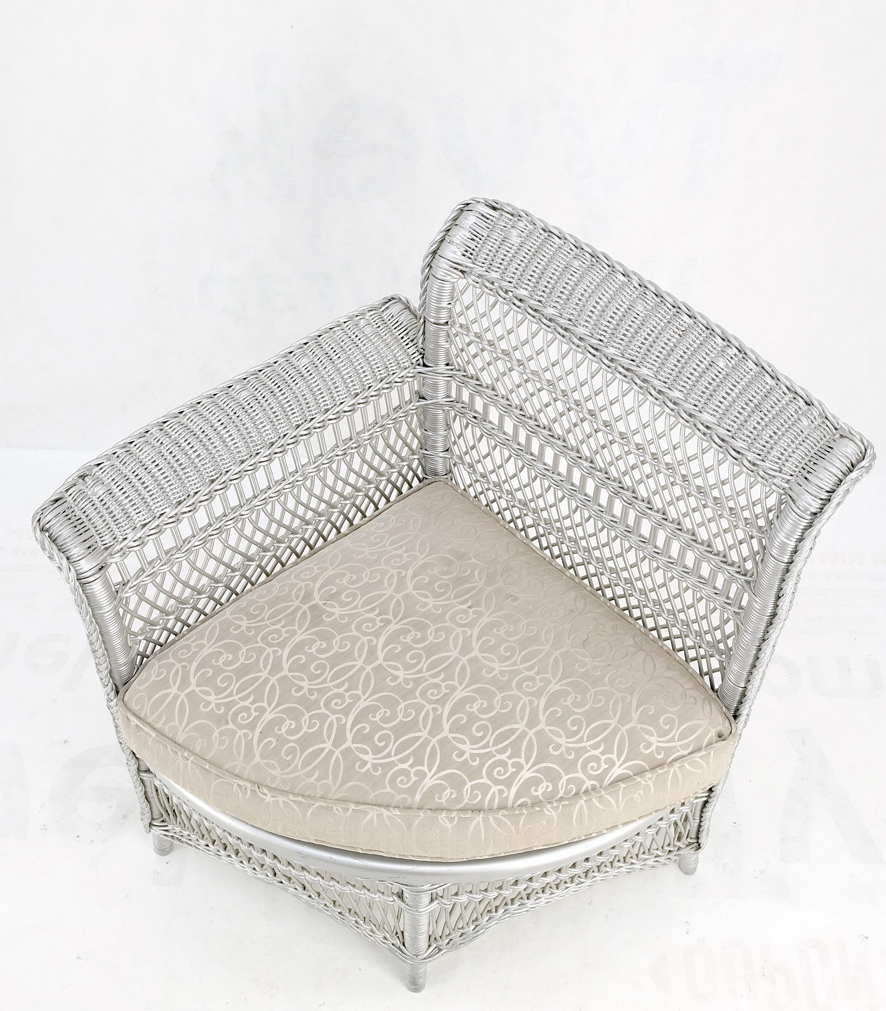 Antique wicker corner chair finished painted in silver metal finish mint.