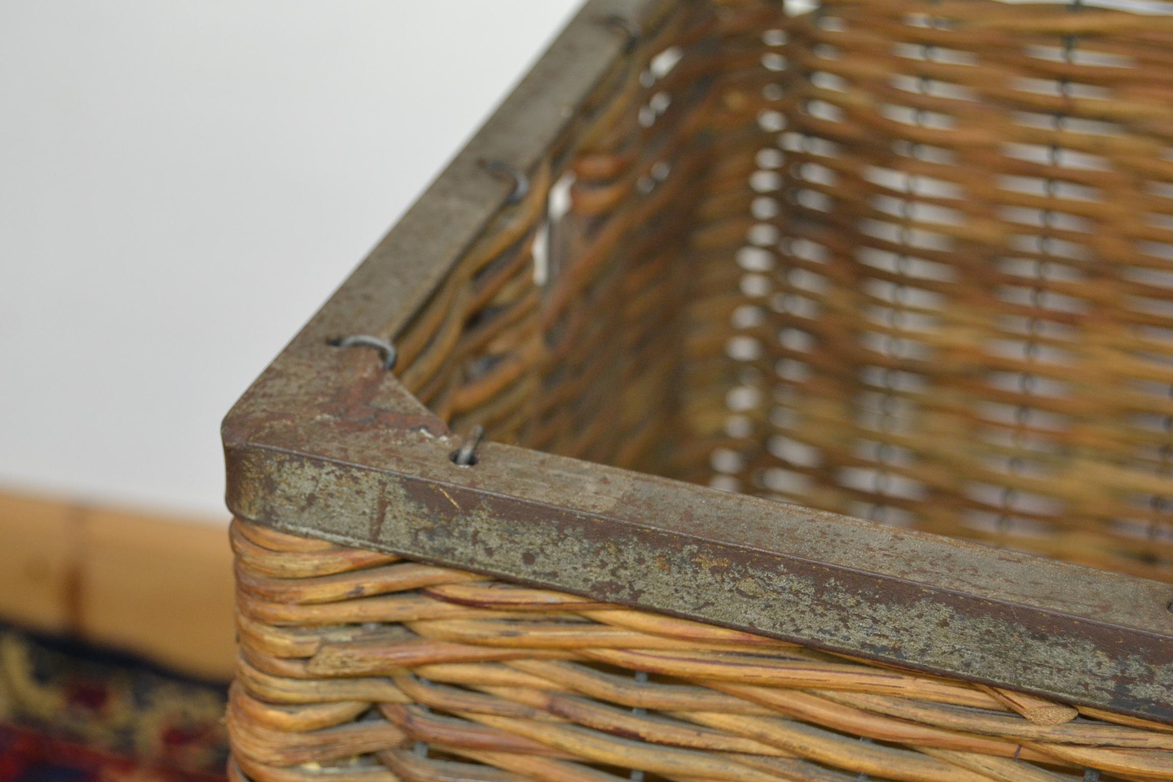 Cast Antique Wicker Factory Basket on Wheels