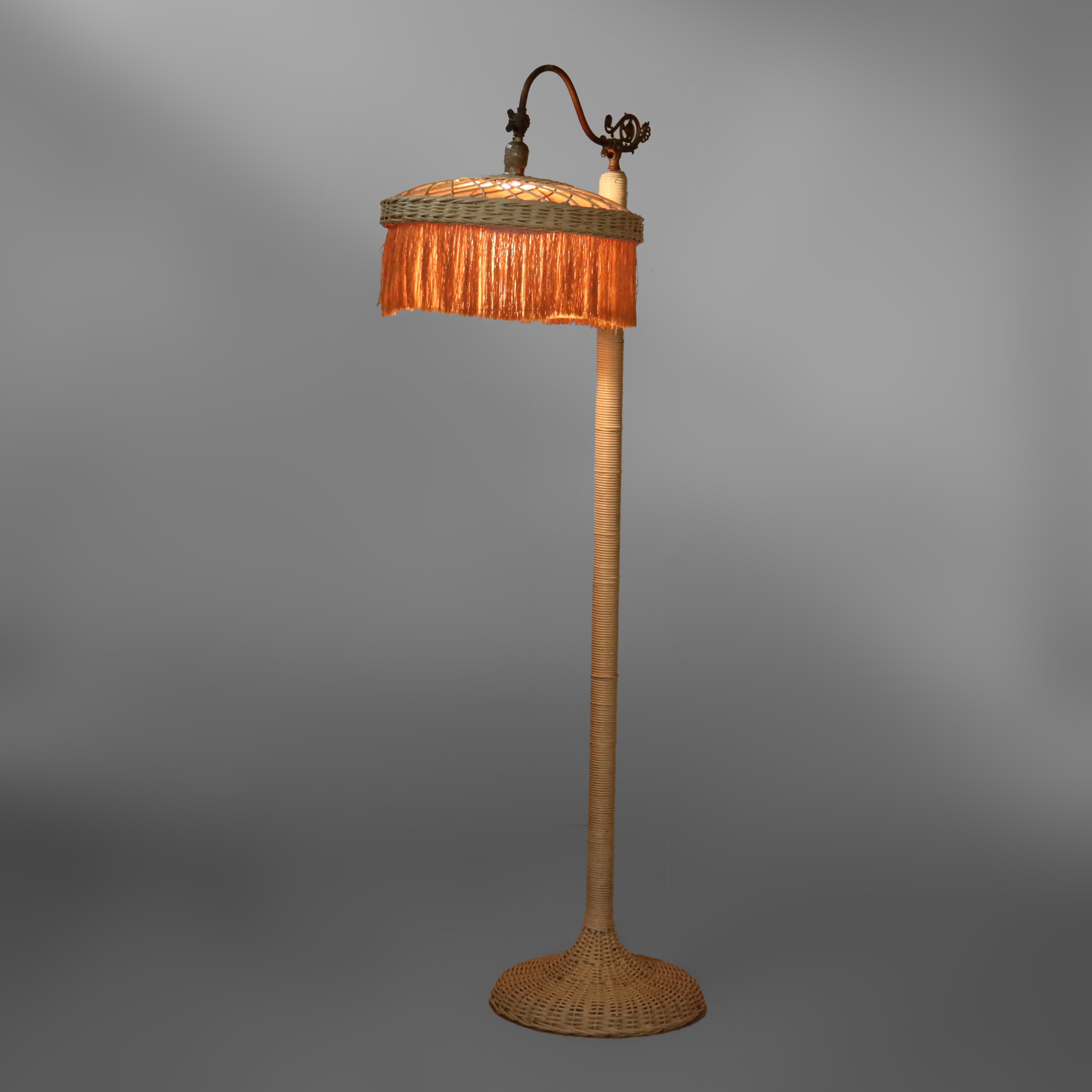 ***Reduced In-House Delivery Rates - Click on “Ask Seller” to Request a Quote***
Antique Wicker Floor Lamp C1910.     
61 3/4