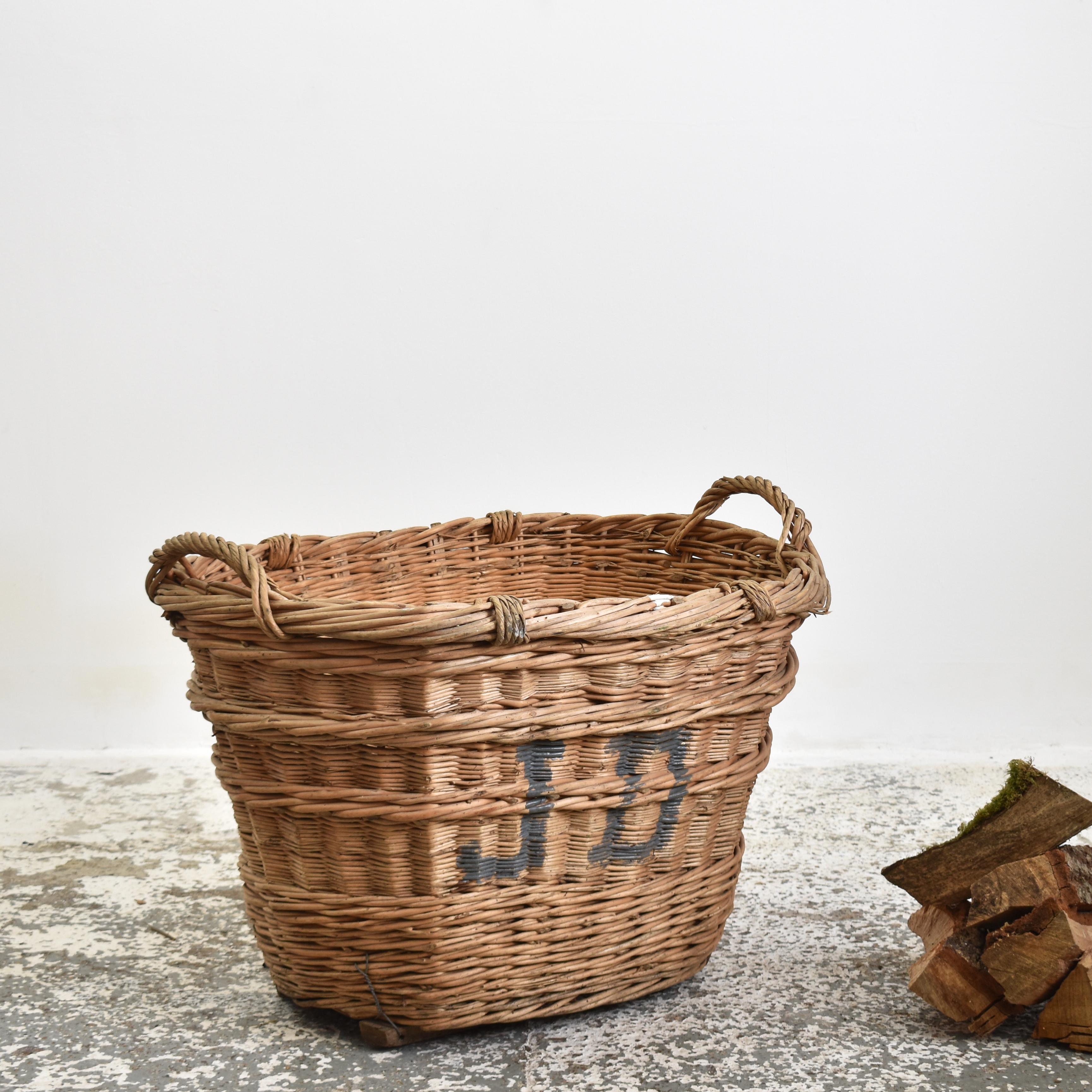 Large Antique Champagne Harvest Basket – L

A beautiful hand-made wicker champagne basket from France used to harvest grapes in the champagne region of Reims. The markings on the end identify the grower and vineyard it belonged to. The basket has