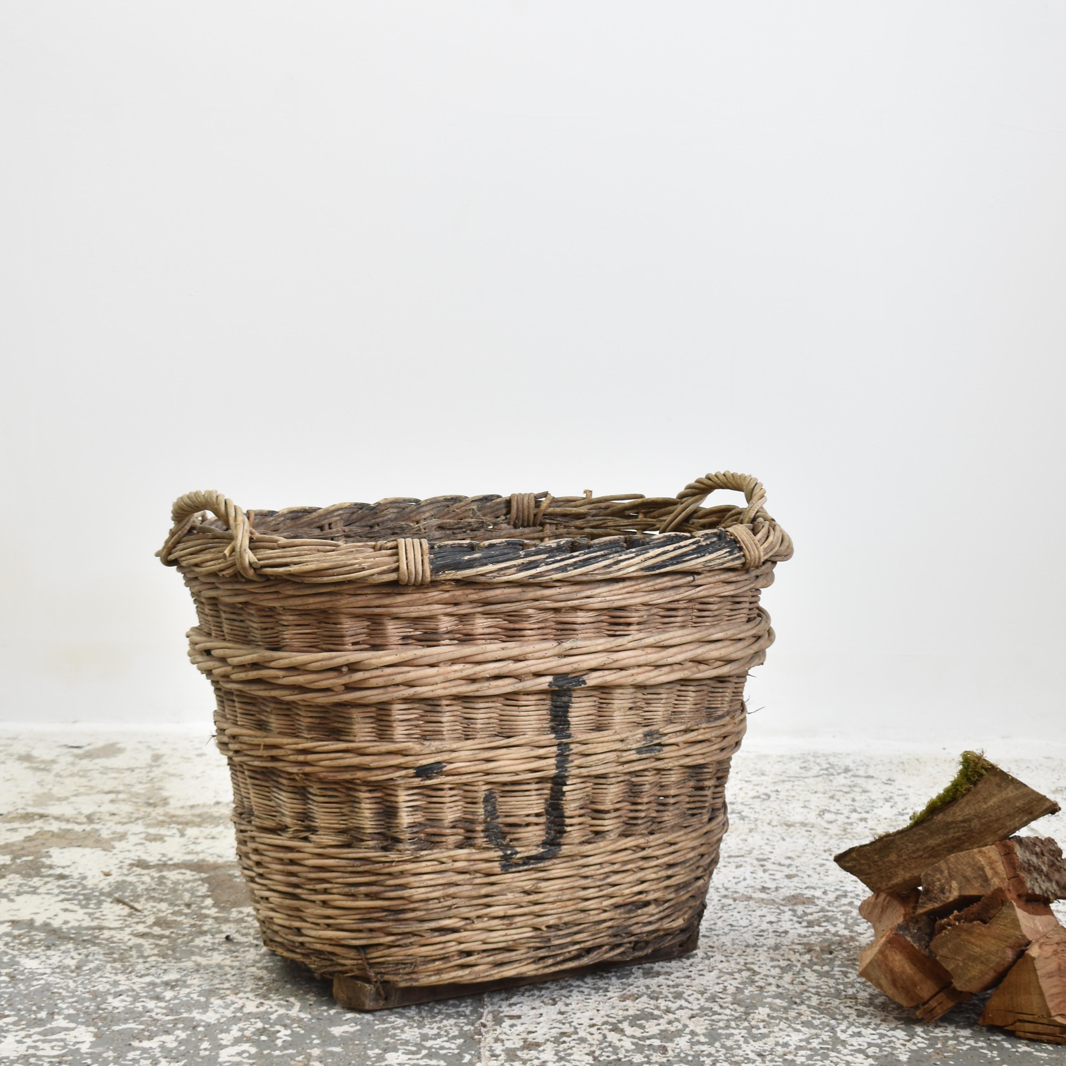 Large Antique Champagne Harvest Basket – L

A beautiful hand-made wicker champagne basket from France used to harvest grapes in the champagne region of Reims. The markings on the end identify the grower and vineyard it belonged to. The basket has