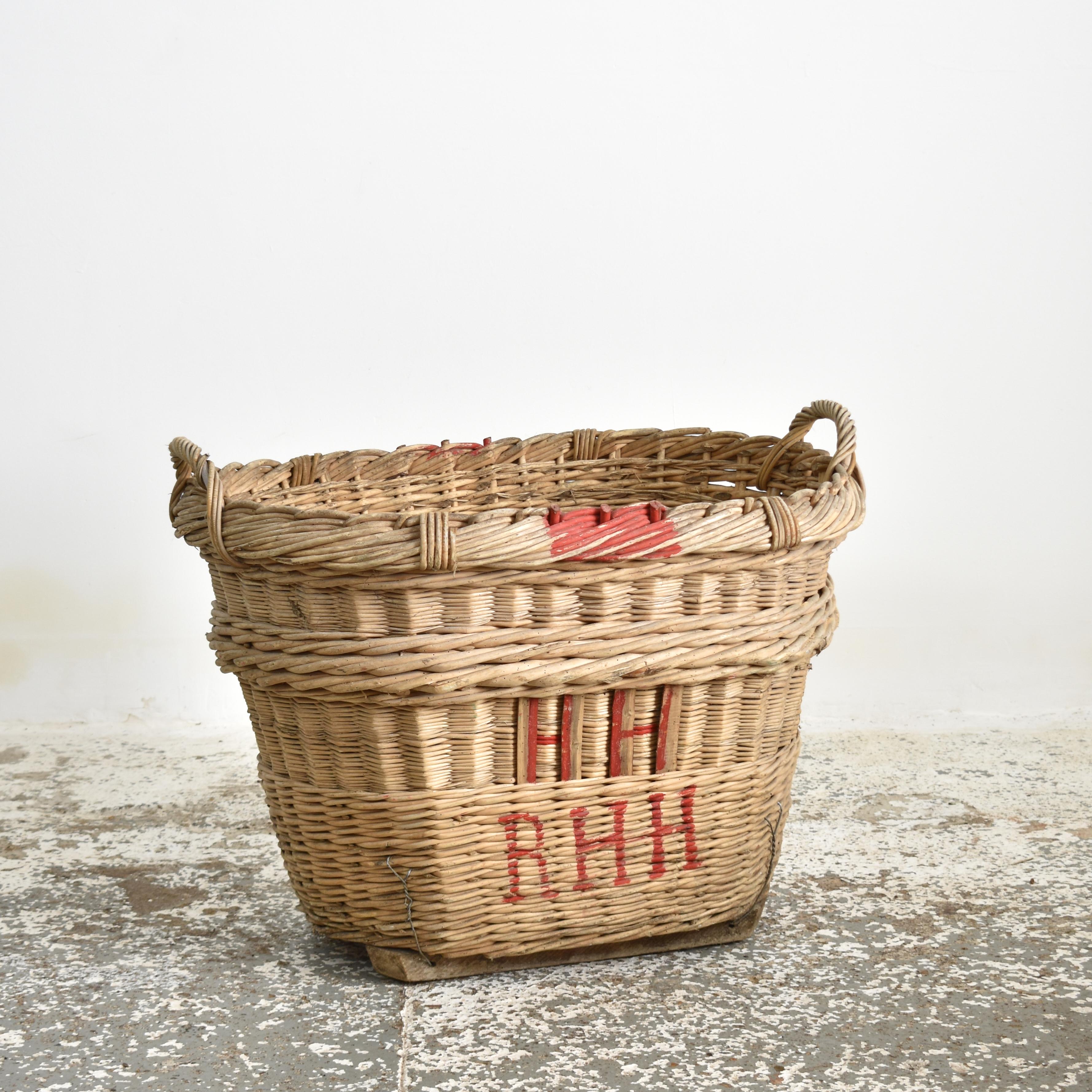 Large Antique Champagne Harvest Basket – R

A beautiful hand-made wicker champagne basket from France used to harvest grapes in the champagne region. The markings identify the grower and vineyard it belonged to. The basket has reinforced sides with