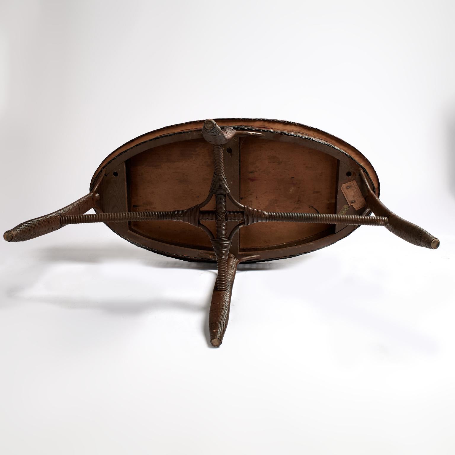 Antique Wicker Oval Table by Lloyd Loom For Sale 4