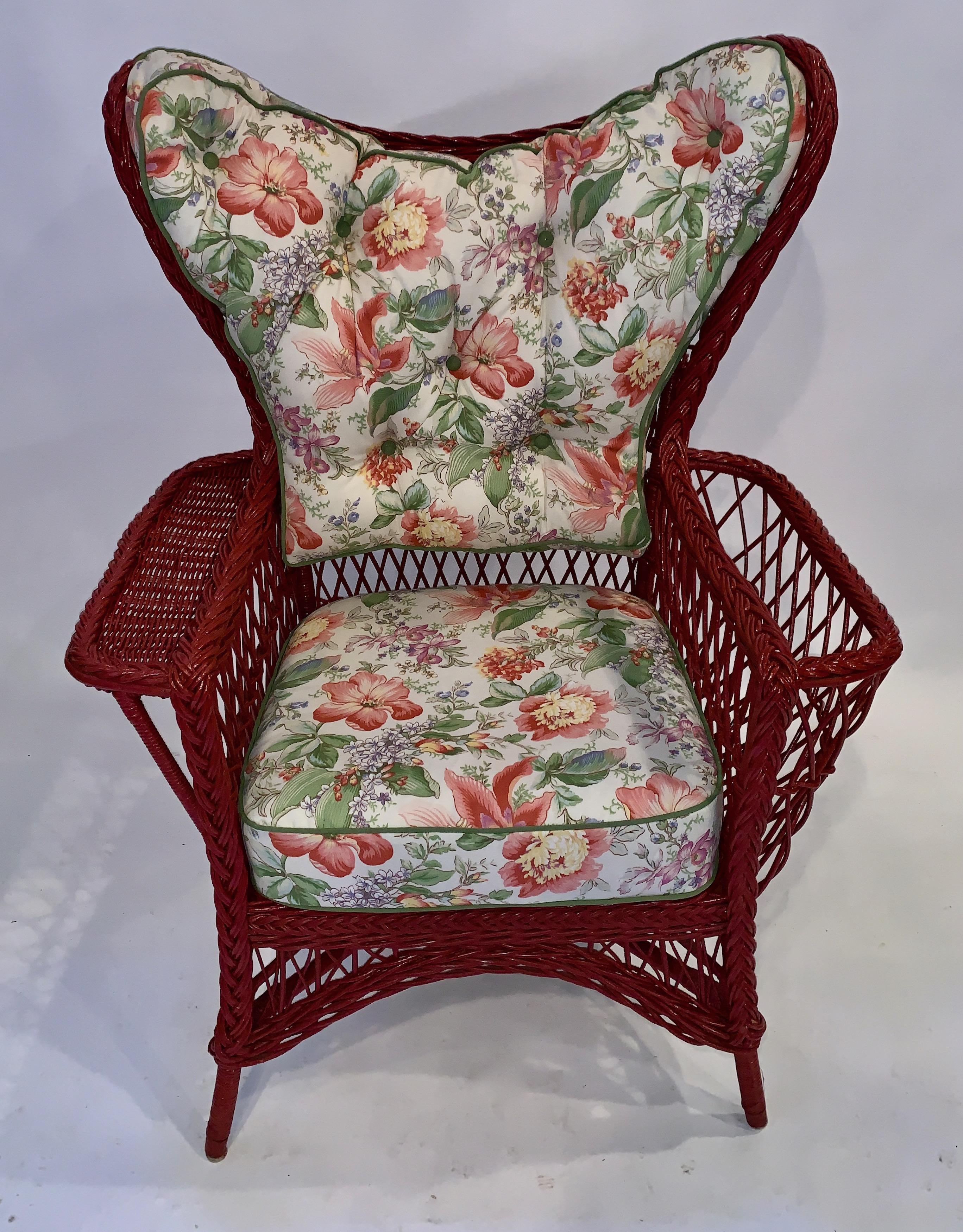 A rare oversized Bar Harbor style wing chair, American, C. 1900- 1910, attributed to the Heywood Wakefield Company.
This generously sized hand woven wicker wing chair is unique in styling in that it has a curved wing design that is very stylish with