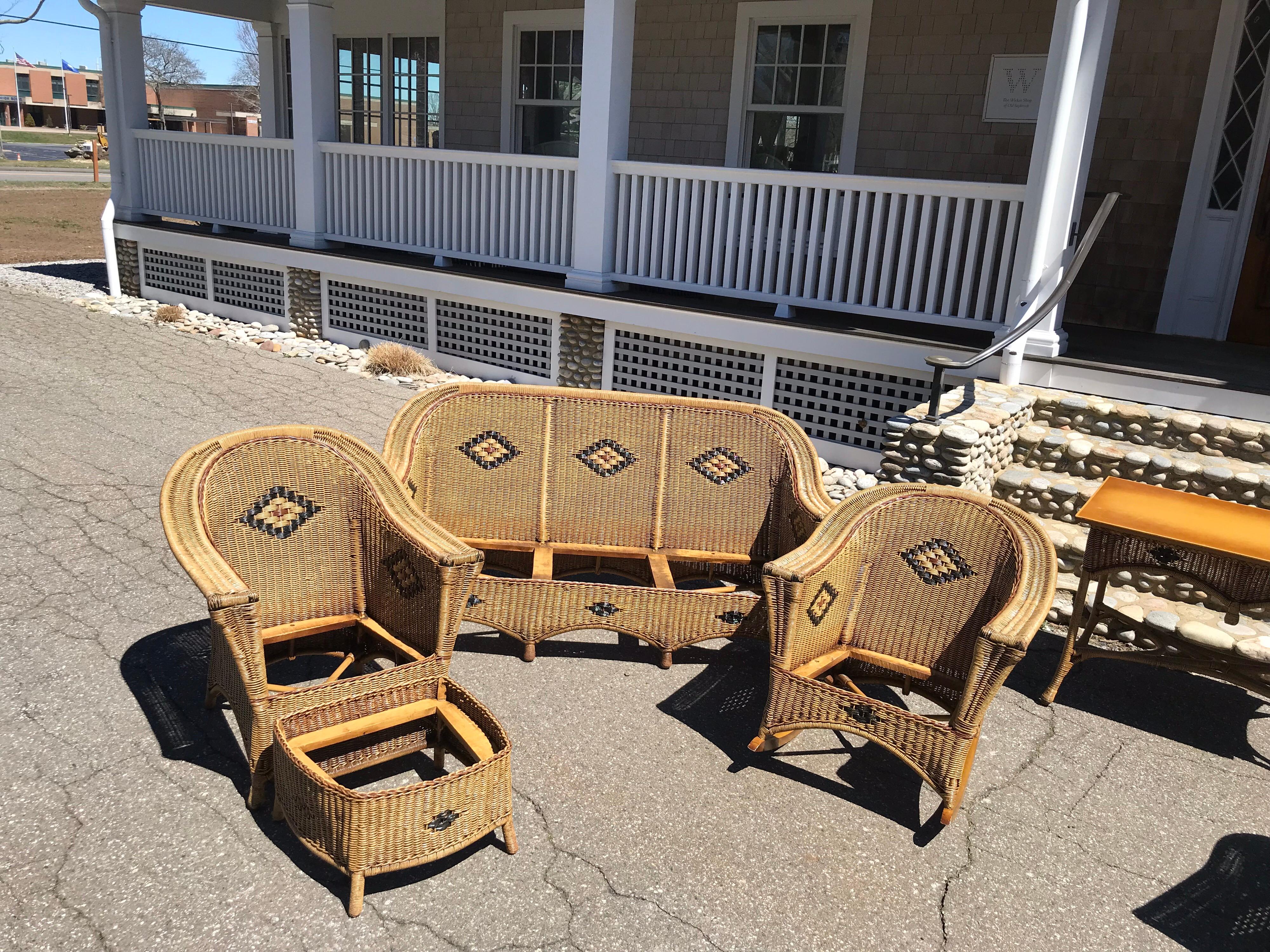 This is a rare twelve-piece antique wicker ensemble by The Brighton Furniture Company of Island Pond, Vermont. Manufactured in the 1920s, it was purchased new in 1929 by the Vermont Masonic Lodge. The set is comprised of two sofas, four chairs, two