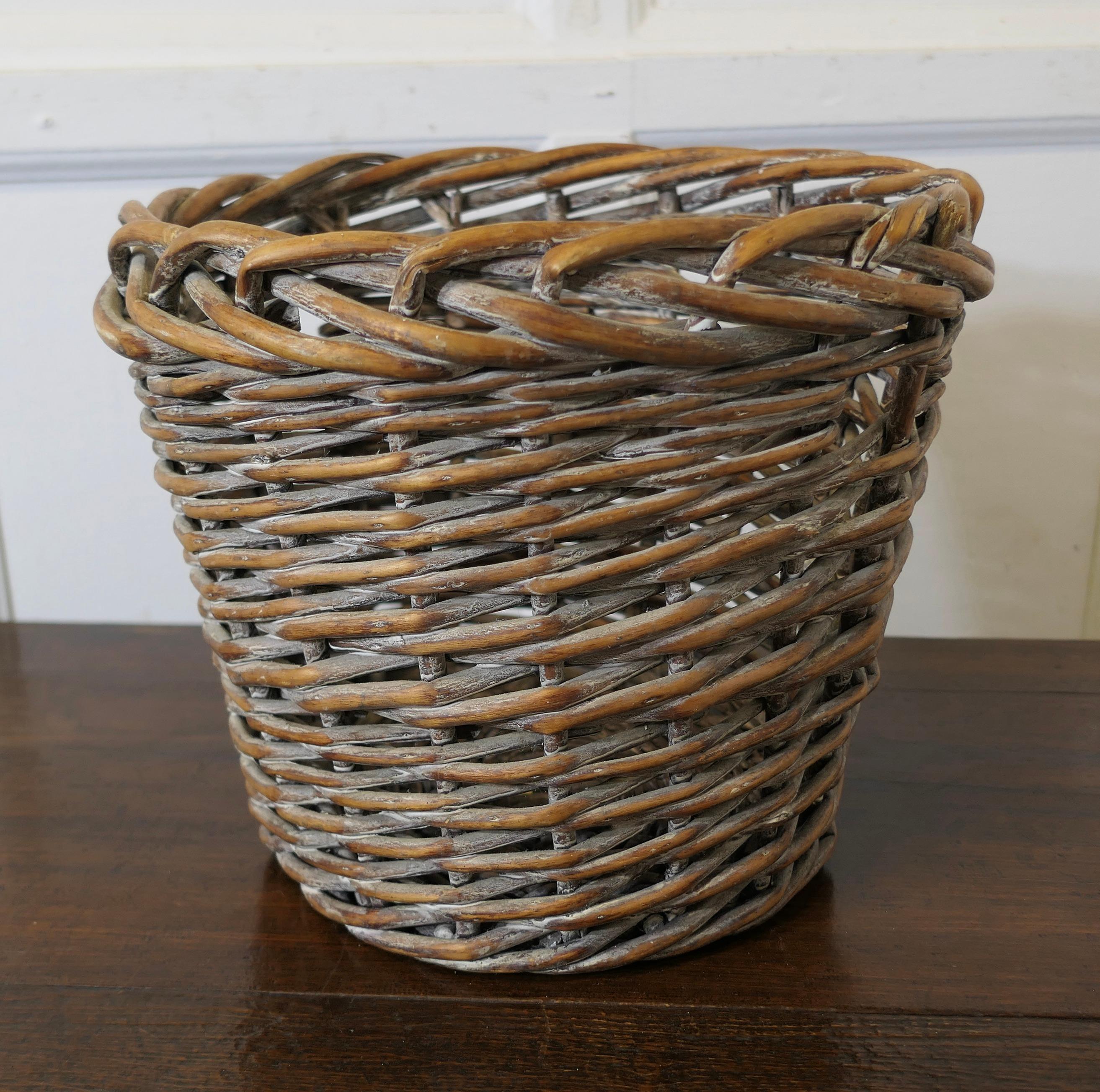 Antique Wicker Waste Paper Basket

This is an excellent example and in remarkably good condition for its age, the basket is very clean inside and out would make a good storage piece

The basket is 12” tall and 13” in diameter 
TFB162