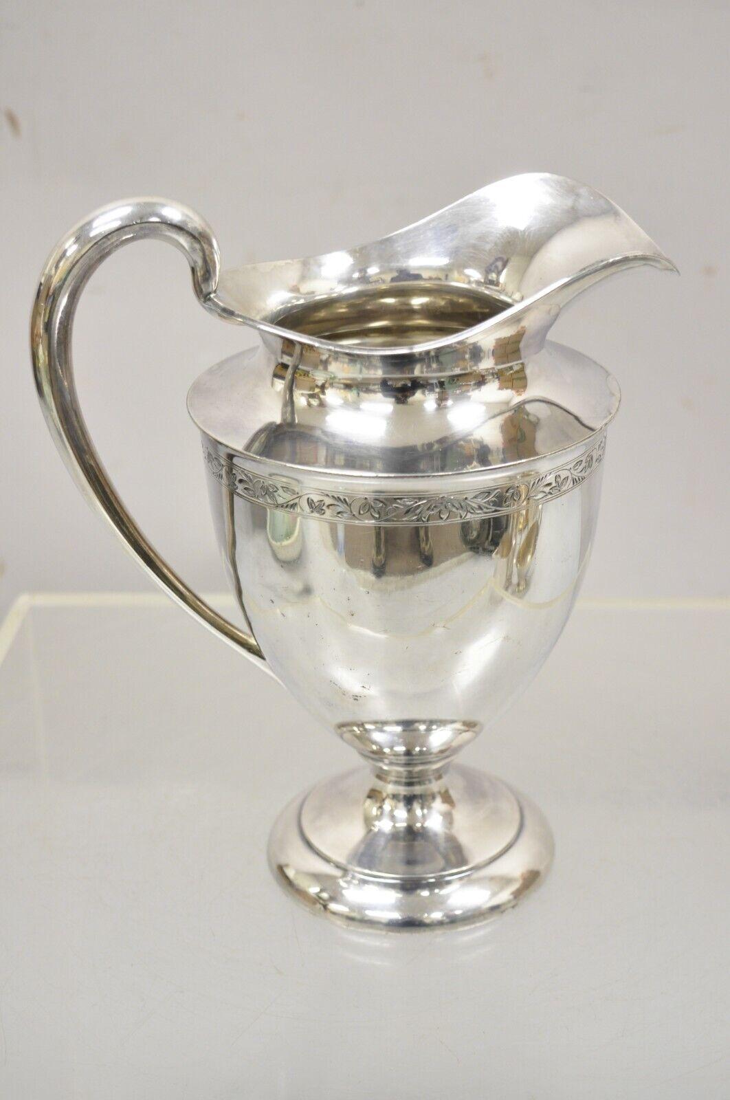 Antique Wilcox S.P. Co International 7016 Silver Plated Water Pitcher. Circa Early 20th Century. Measurements: 10.5