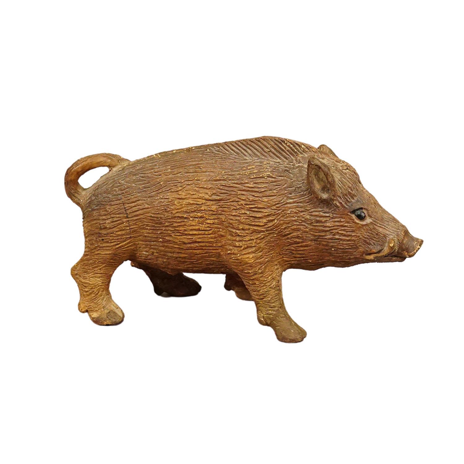 Antique Wild Boar Piggy Bank Made of Clay

An antique piggy back in the shape of a wild boar. Handmade of clay. It has no opening on the base thus needs to be destroyed to get the money out. A great decoration idea for every