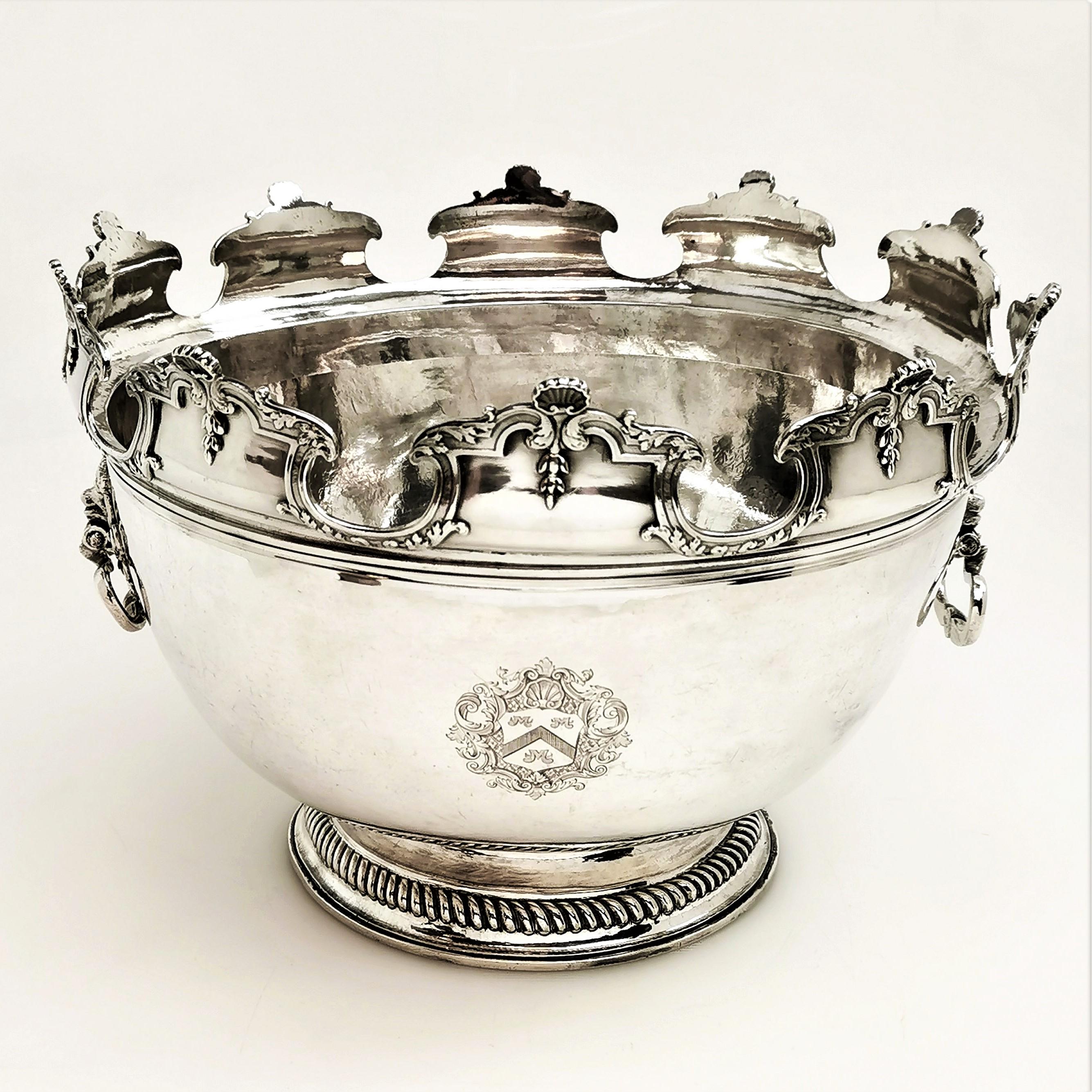 A magnificent William III Antique solid Silver Punch Bowl with an original removable silver collar, allowing for use as a traditional punch bowl or as an elegant serving bowl. The Bowl is typical of the period although notably large, and is