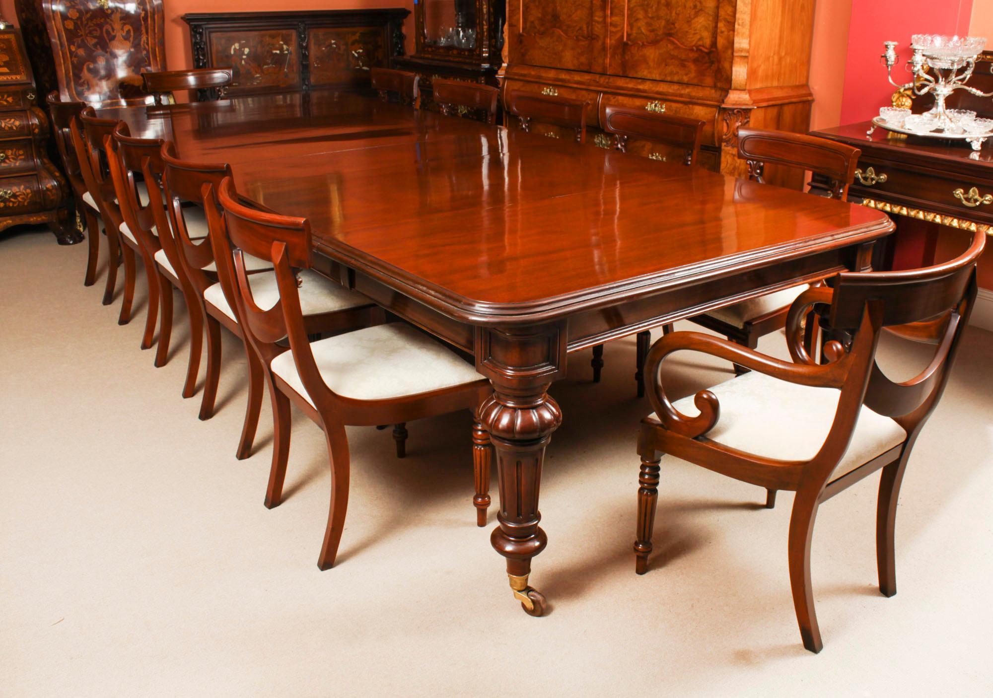 This is a beautiful antique William IV  flame mahogany extending dining table, circa 1835 in date.
 
This amazing table can  seat  fourteen people in comfort and has been hand-crafted from beautiful solid flame mahogany.
 
The beautifully figured