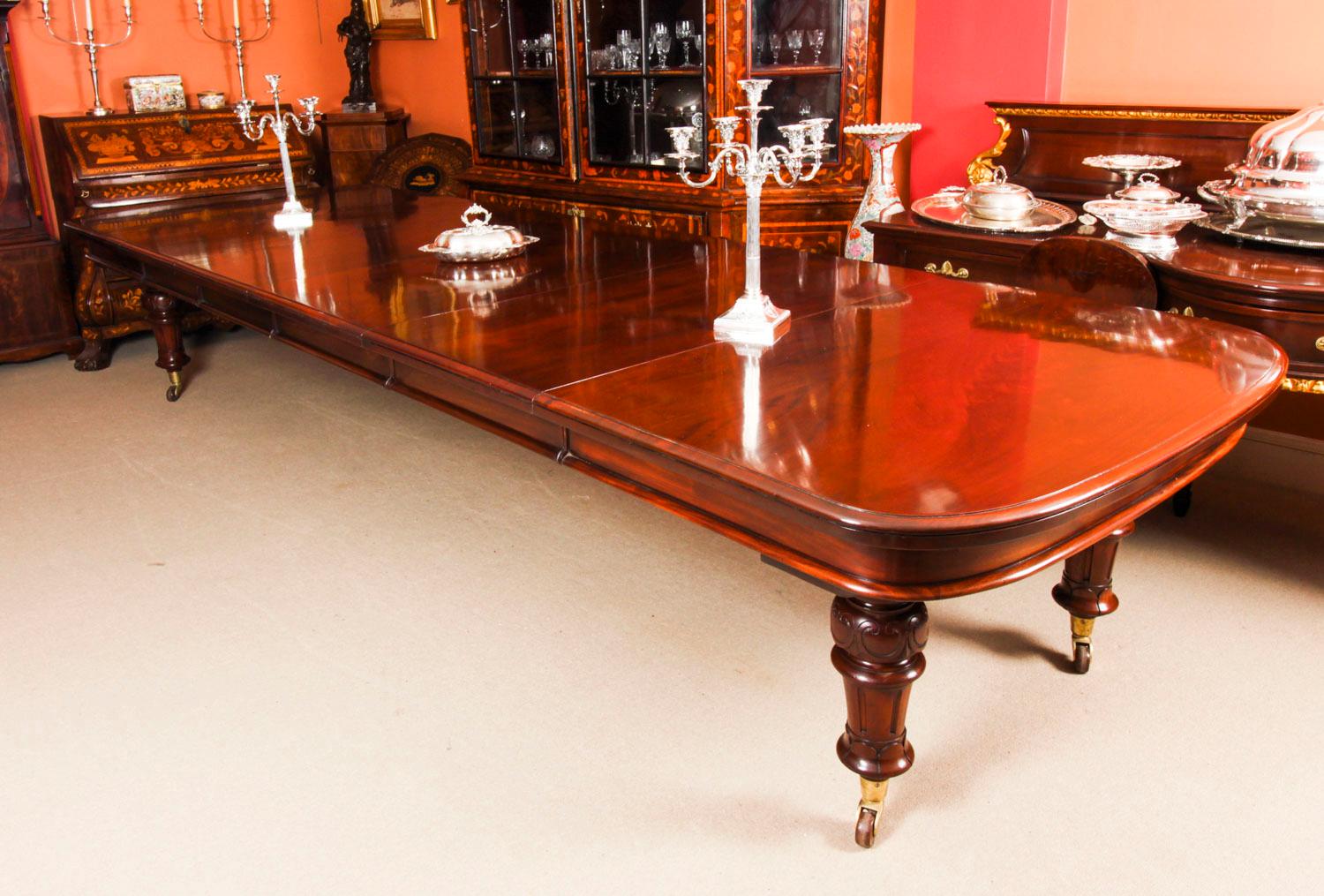 This is a beautiful antique William IV flame mahogany extending dining table, circa 1835 in date.

This amazing table can seat fourteen people in comfort and has been hand-crafted from beautiful solid flame mahogany.

The beautifully figured flame