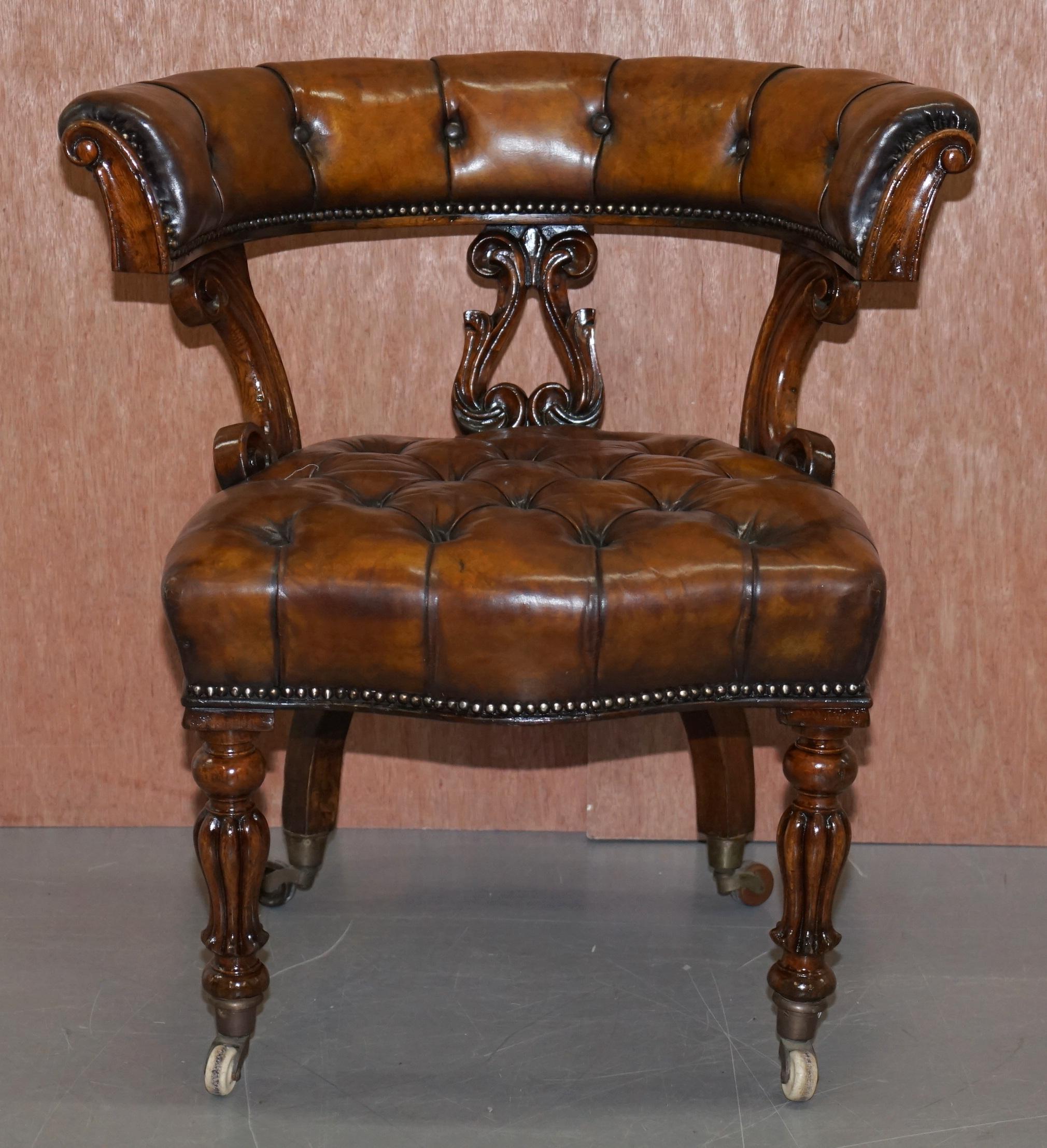We are delighted to offer for sale this very fully restored circa 1830 horse shoe back Chesterfield hand dyed brown leather office chair

This chair is really quite exquisite, its one of the earliest types of swivel chairs ever made, the frame is