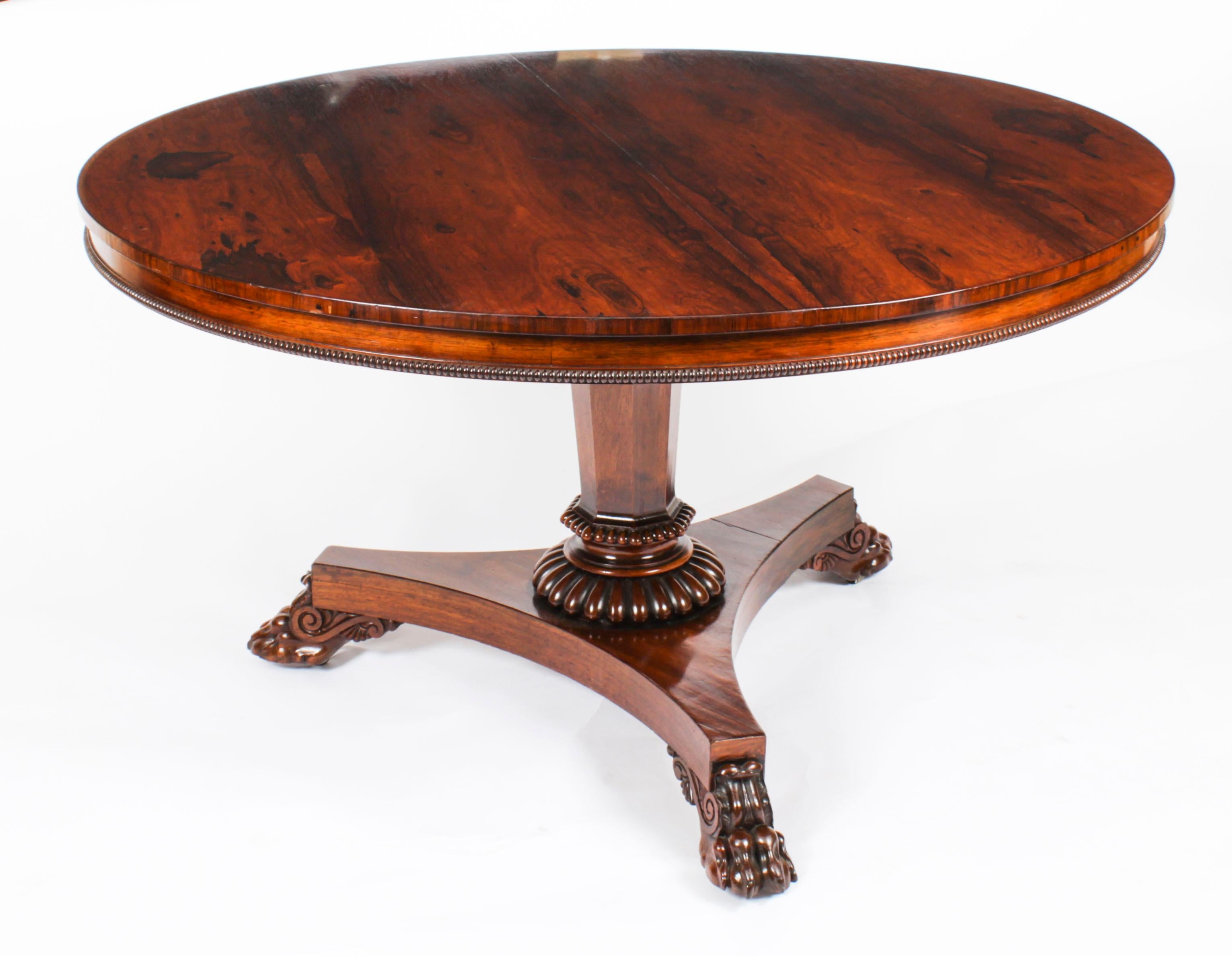 This is an elegant and rare English antique William IV Gonçalo Alves centre / breakfast table by the world renowned cabinet makers Gillows of Lancaster, circa 1830 in date. 
 
The tilt-top table in stunning Gonçalo Alves, having stunning grain to