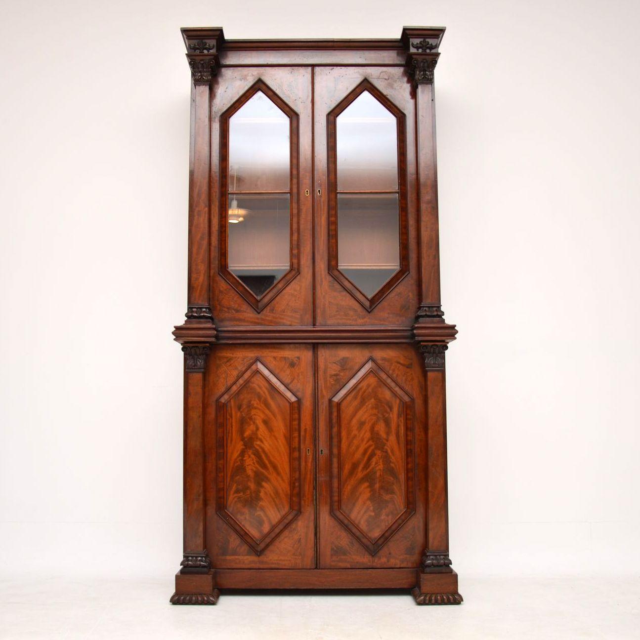 Very high quality and unusually designed antique William IV period mahogany two section bookcase. It’s all original, from the 1830-1837 period and is in excellent condition. The front section is all flame mahogany, with diamond shaped bottom door