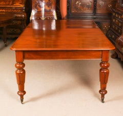 Ancienne table de salle à manger à rallonge William IV en acajou flammé 19ème siècle