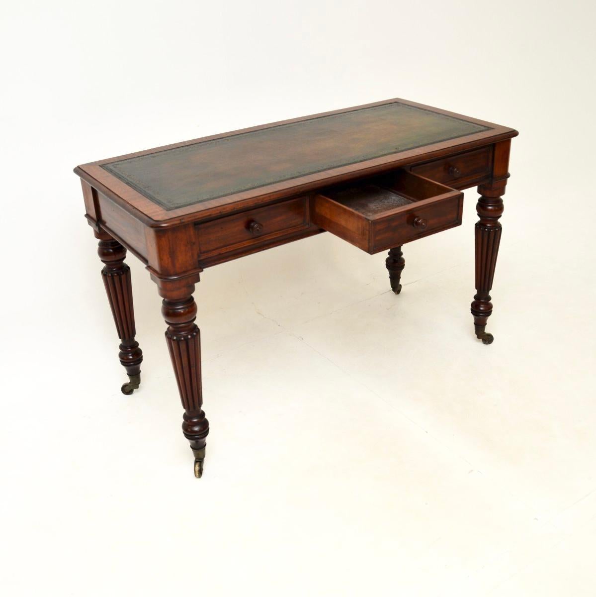 A great looking antique William IV leather top writing table / desk. This was made in England, it dates from between 1830-1837.

It was made by the company of renowned cabinet maker Thomas Willson. It is stamped M. Willson inside the drawer, as the