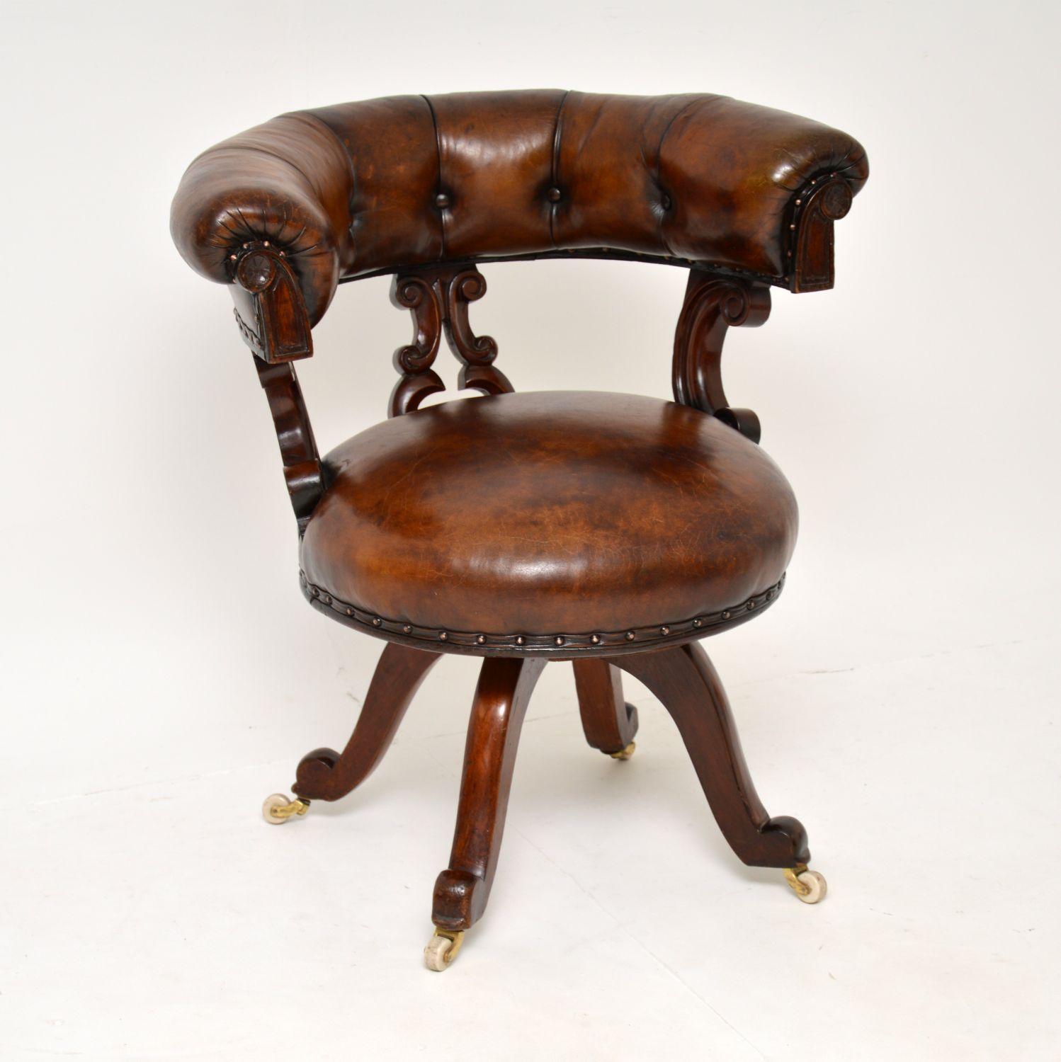 A fantastic and very rare antique William IV period swivel desk chair. This was made in England, it dates from around the 1840-1860’s.

This has a wonderful design, with very generous proportions and a beautifully carved wood frame. It sits on a