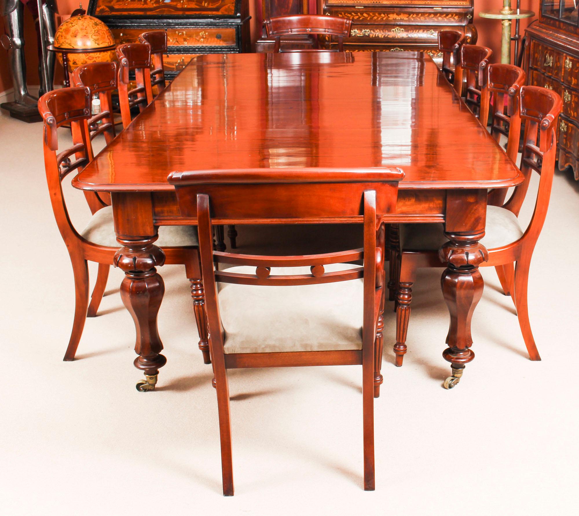This is a gorgeous dining set comprising an antique William IV dining table circa 1830 in date with ten vintage bar back dining chairs.

The magnificent antique William IV solid mahogany dining table can seat ten people in comfort and is circa 1830