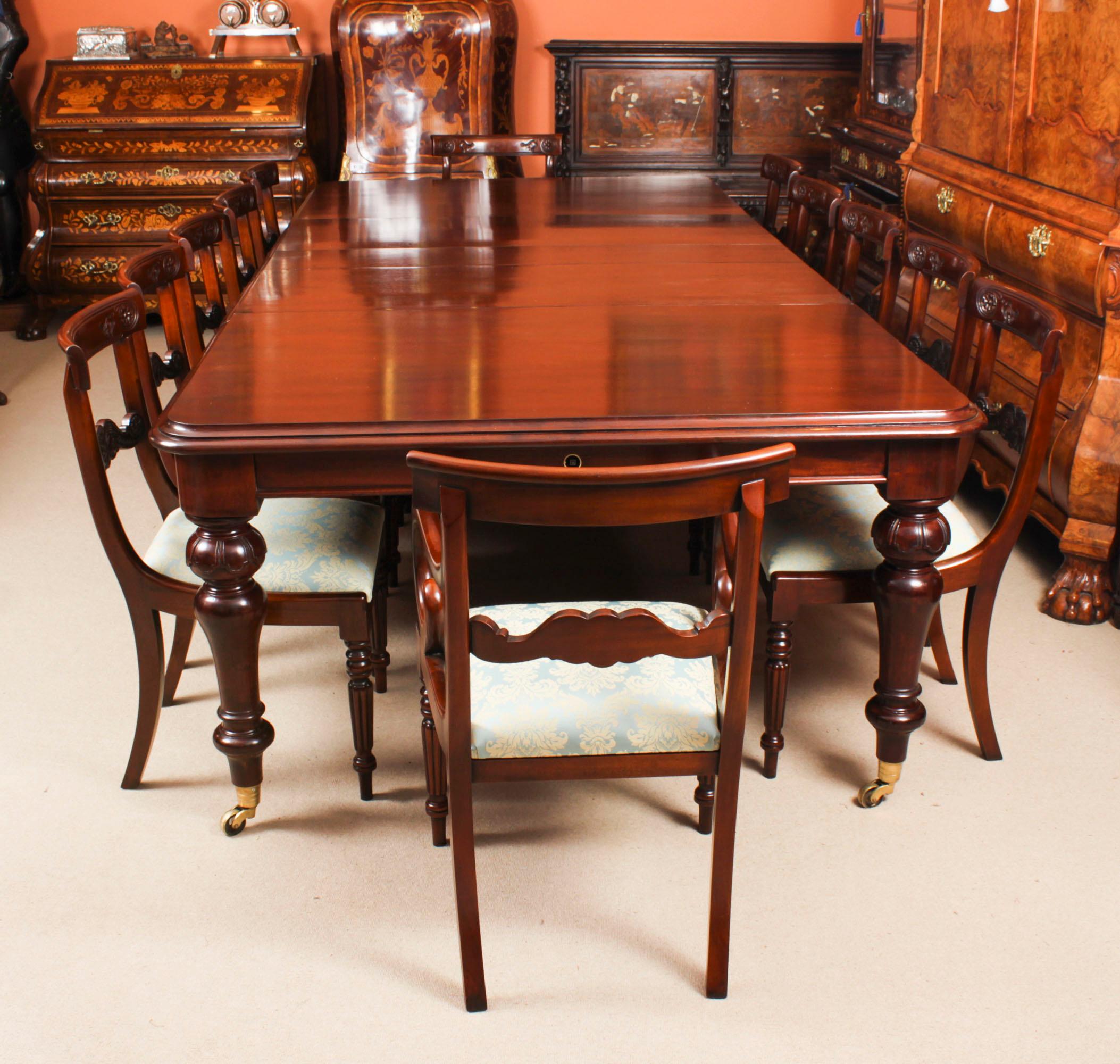This is a fantastic  dining set comprising of an antique William IV dining table, C1835 in date,  with a set of ten bar back  dining chairs, dating from the late  20th century. 

The magnificent antique William IV solid mahogany dining table can can
