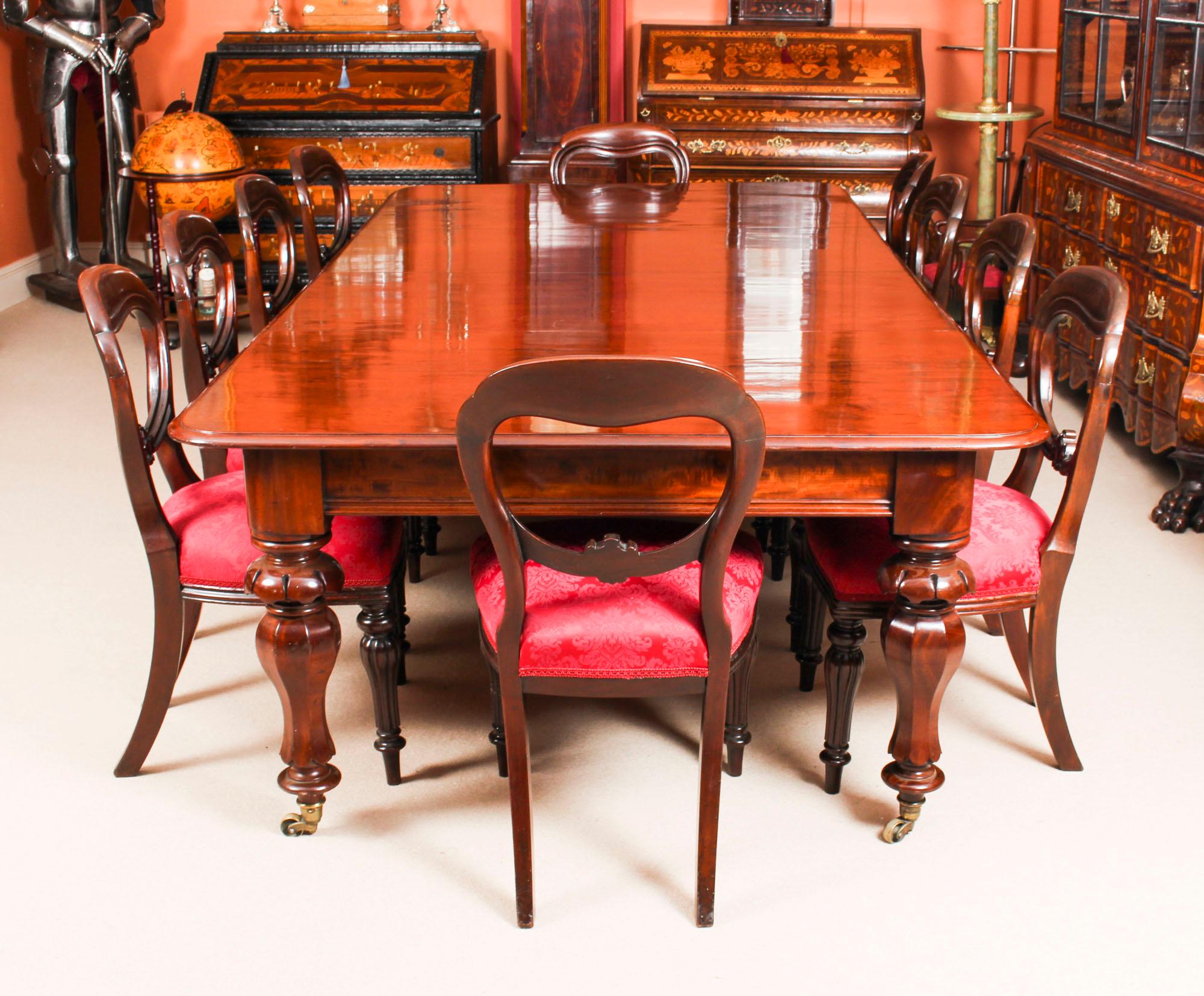 This is a fabulous dining set comprising an antique William IV dining table with ten antique balloon back dining chairs, all circa 1830 in date.

The magnificent antique William IV solid mahogany dining table can seat ten people in comfort and is