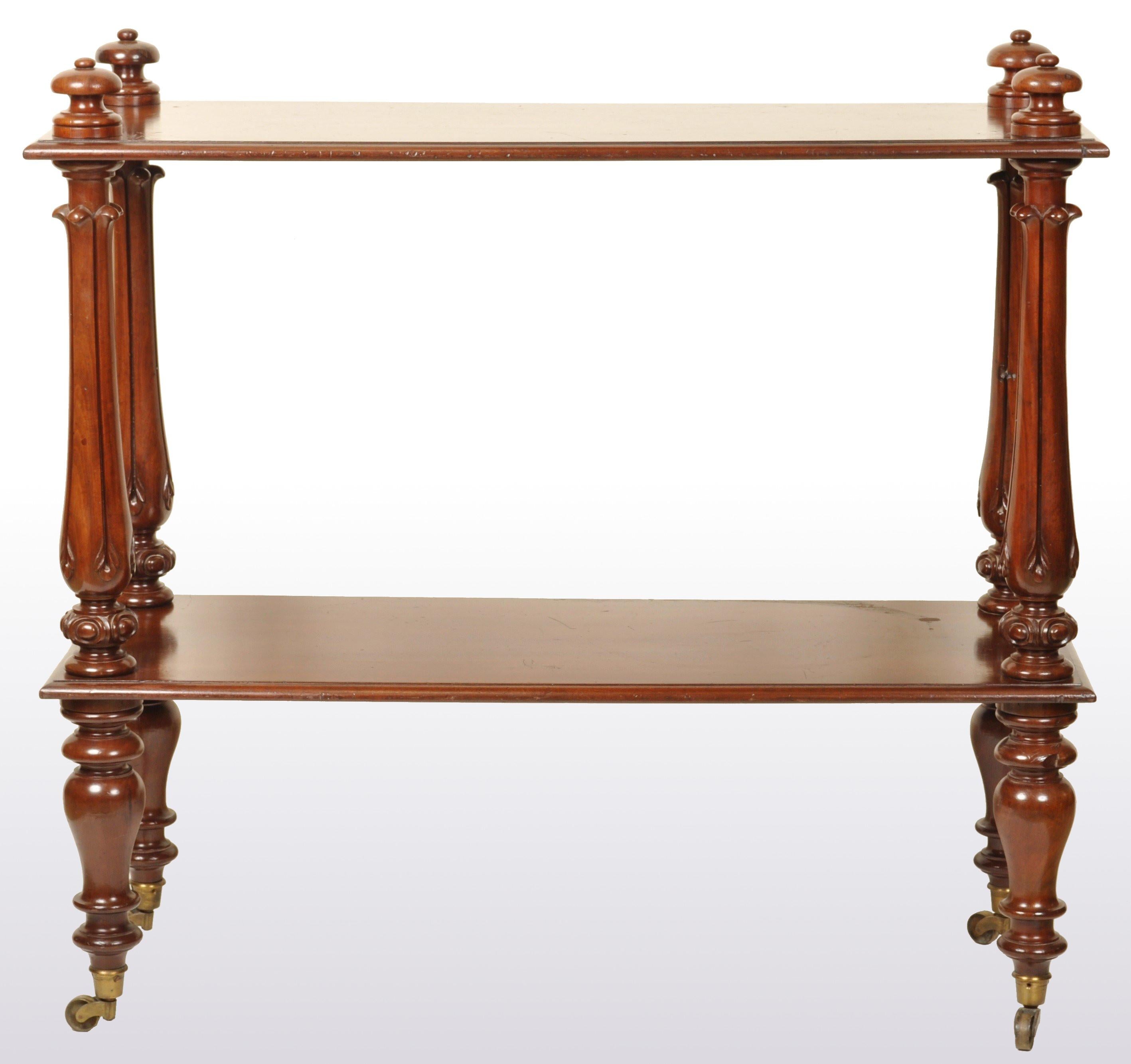 Antique William IV Mahogany dumb-waiter / server / table, circa 1830. Twin tier dumb-waiter with turned mushroom finials to the top of fluted and turned columns, standing on turned legs with original brass casters.