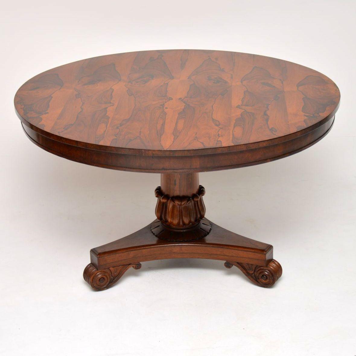 This antique William IV rosewood dining table has to be one of the nicest ones I've come across. It's all original, extremely fine quality and in excellent condition. The pattern of the rosewood veneers on the top are stunning and very unusual. The