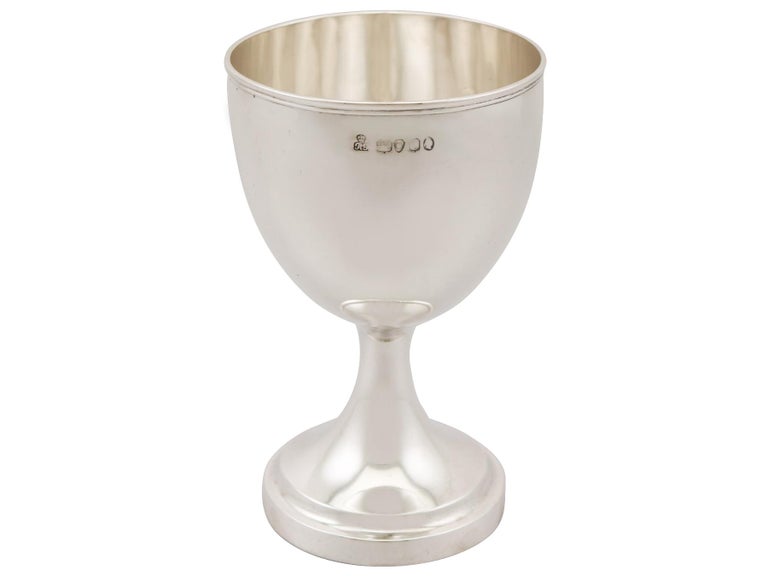 An exceptional, fine and impressive antique William IV English sterling silver goblet made by Robert Garrard II; an addition to our collectable silverware collection.

This exceptional antique William IV sterling silver goblet has a plain bell