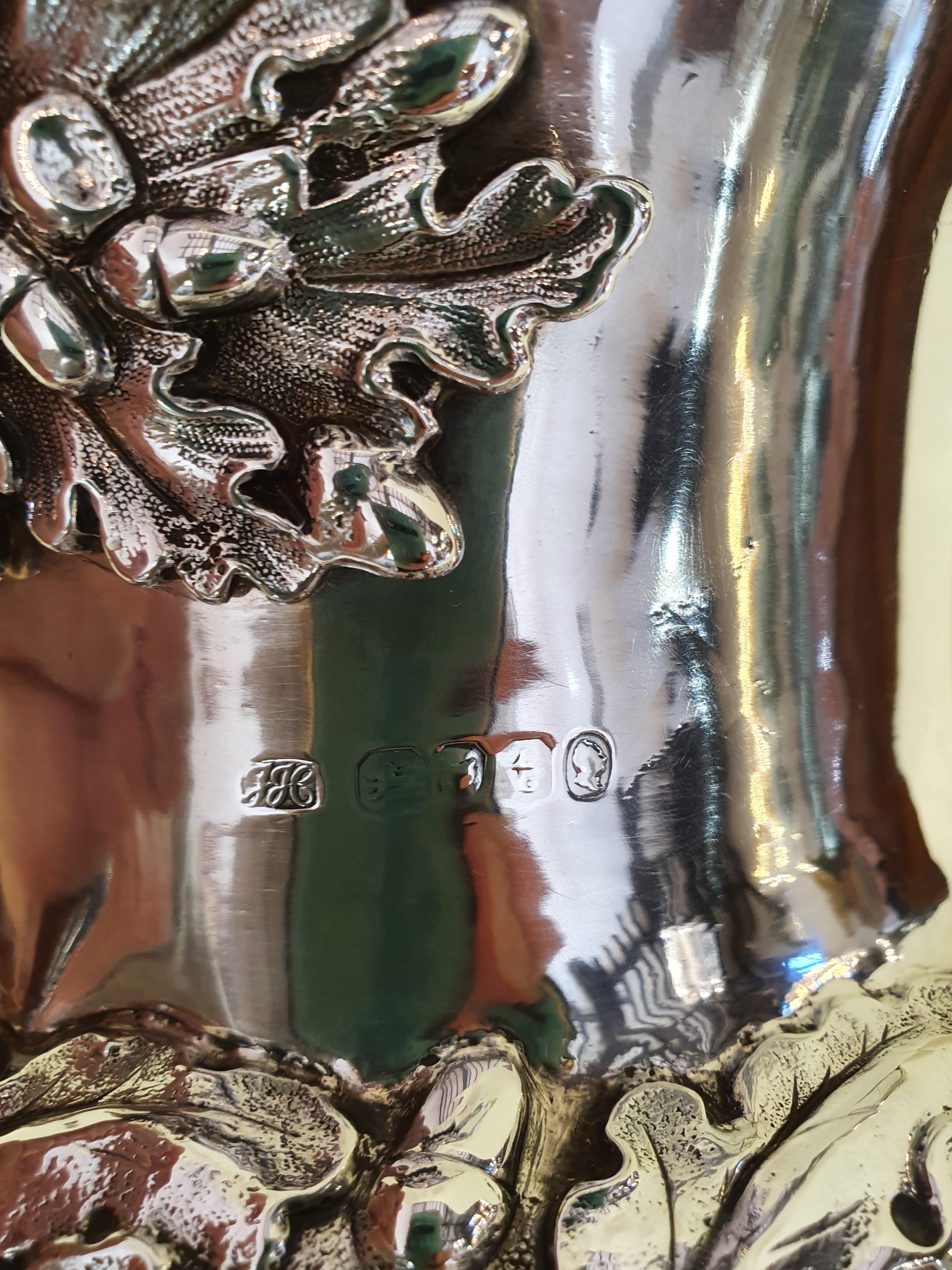 A fine and impressive antique William IV English sterling silver presentation cup by Jason Hobbs.
This presentation cup has a Campania form onto a knopped pedestal to a circular spreading foot
The lower portion of the body is ornamented with