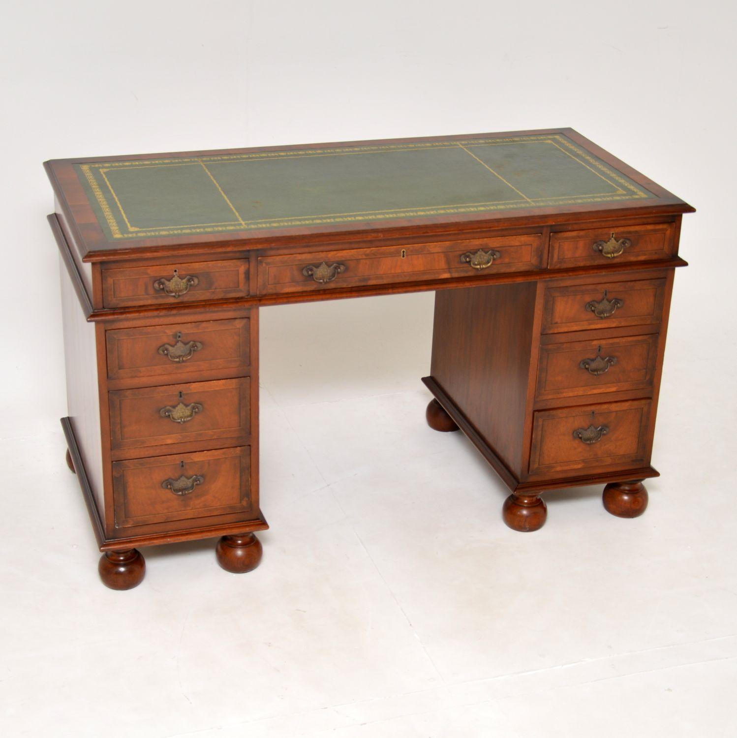 A stunning antique walnut desk, in the William and Mary style. This was made in England, it dates from around the 1930’s period.

The quality is exceptional, this is so well made with gorgeous walnut veneers on a completely solid oak construction.