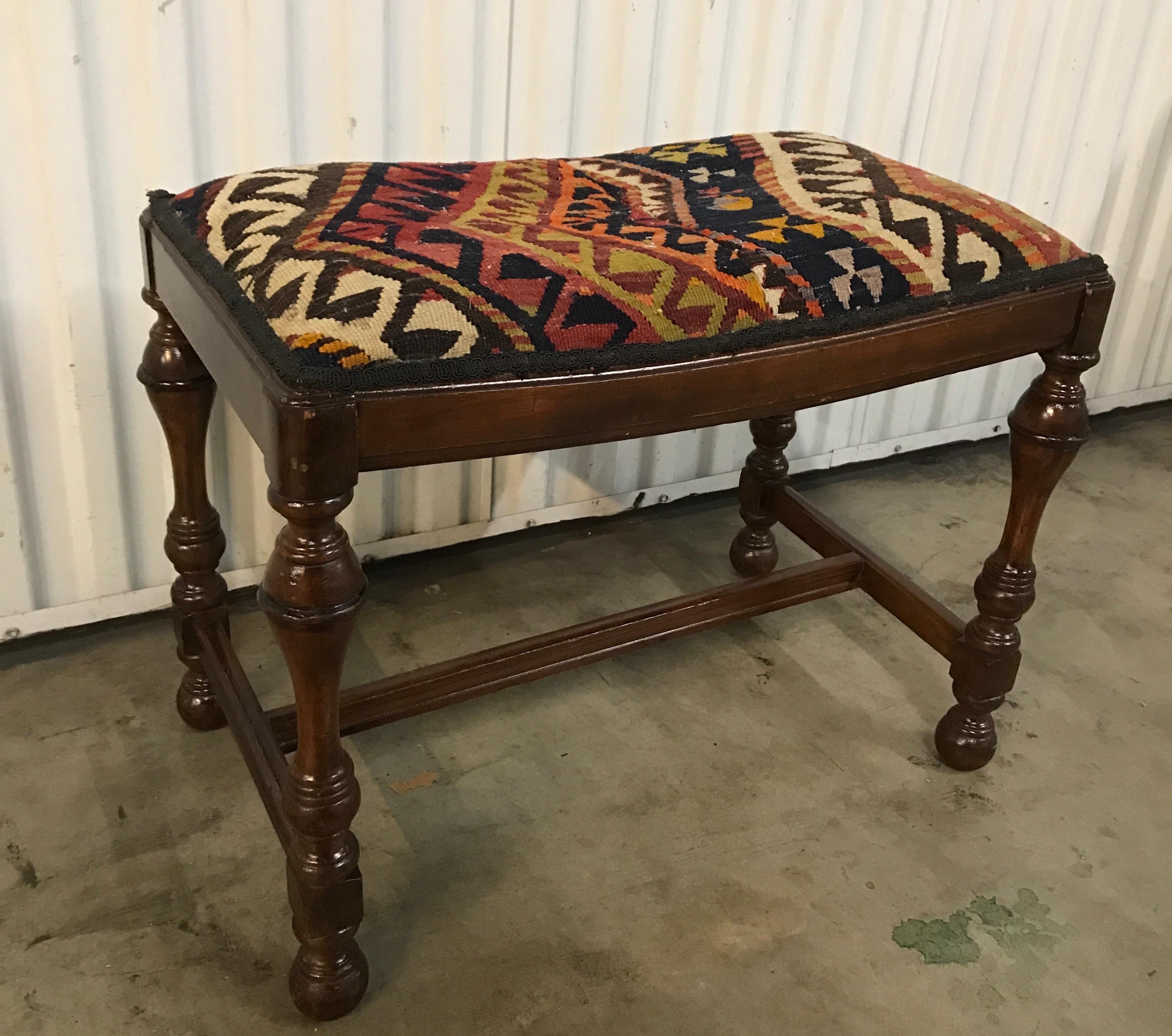 19th century William & Mary style bench with seat upholstered with antique Kilim.