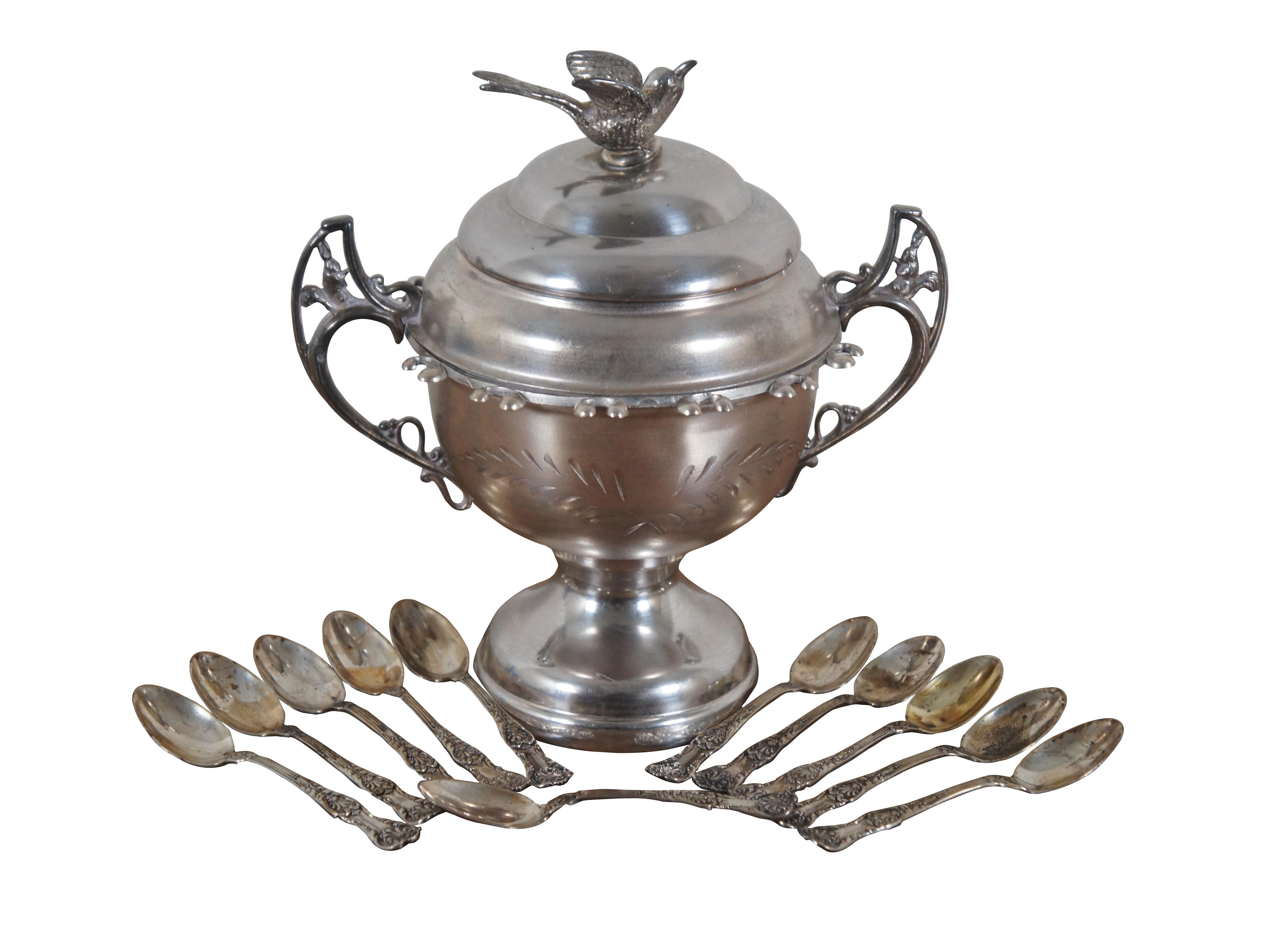 Antique turn of the century 13 piece sugar bowl and hanging spoon set, featuring a trophy urn style bowl with etched palm leaves on the body, brackets to support twelve sugar spoons, squirrels in the pierced handles and a sparrow shaped finial. Set