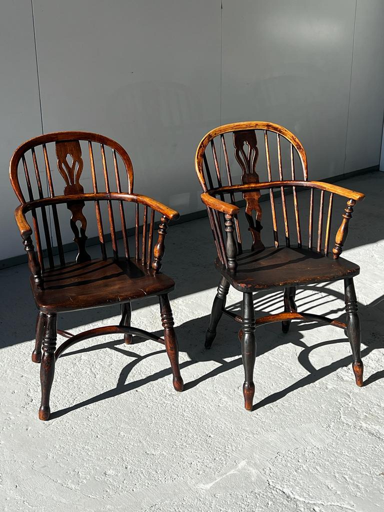 Set of 2 Victorian Windsor armchairs handcrafted in ash and elm. Carved back and turned wood arms and legs. 