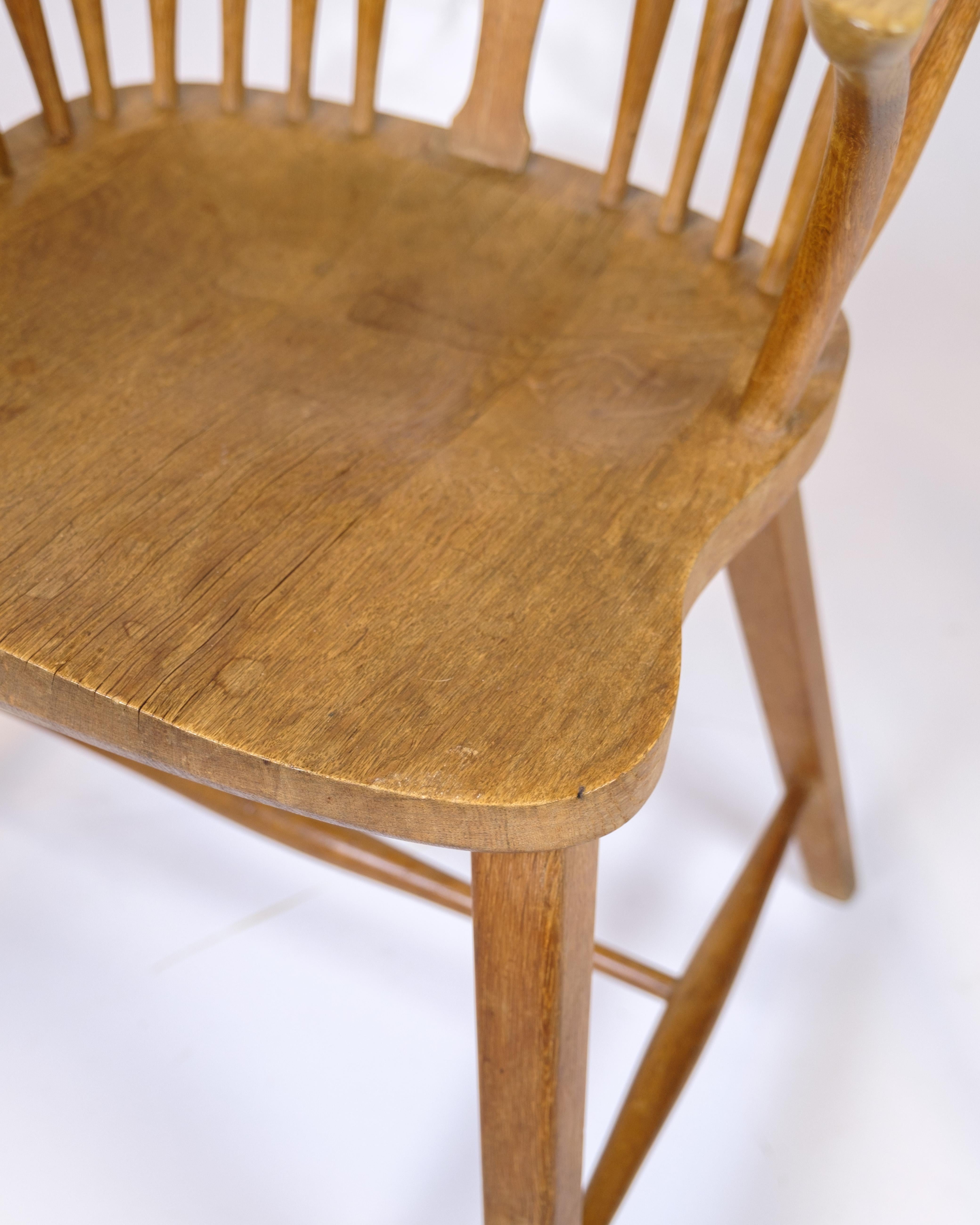 Danish Antique Windsor Armchair In Patinated Oak From 1920s For Sale