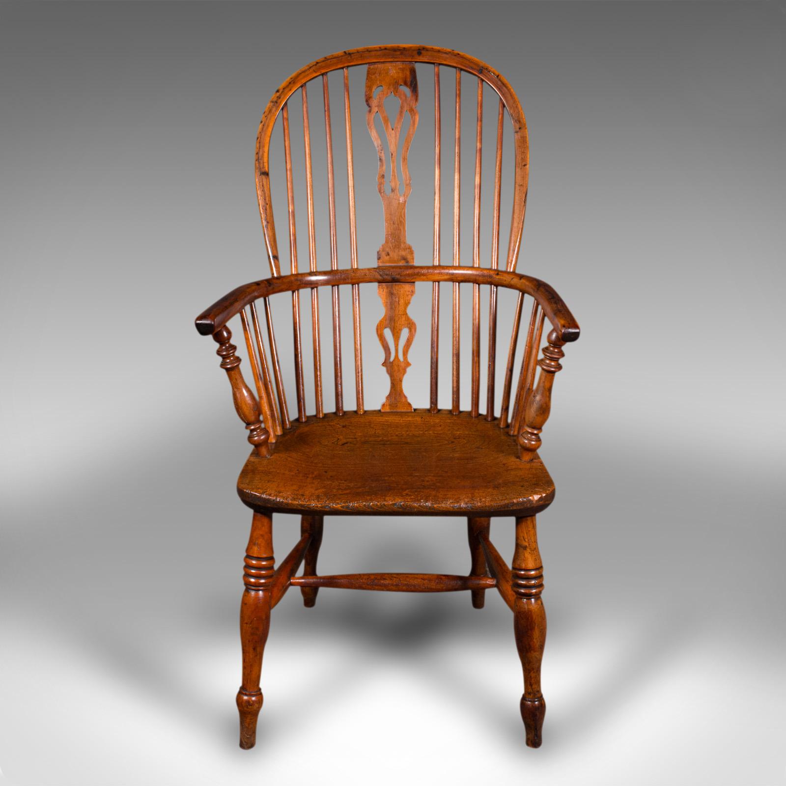 This is an antique Windsor chair. An English, elm and yew elbow or armchair, dating to the Victorian period, circa 1850.

Country house appeal, in distinctive 'Double Windsor' form
Displaying a desirable aged patina and in good order
Elm and yew