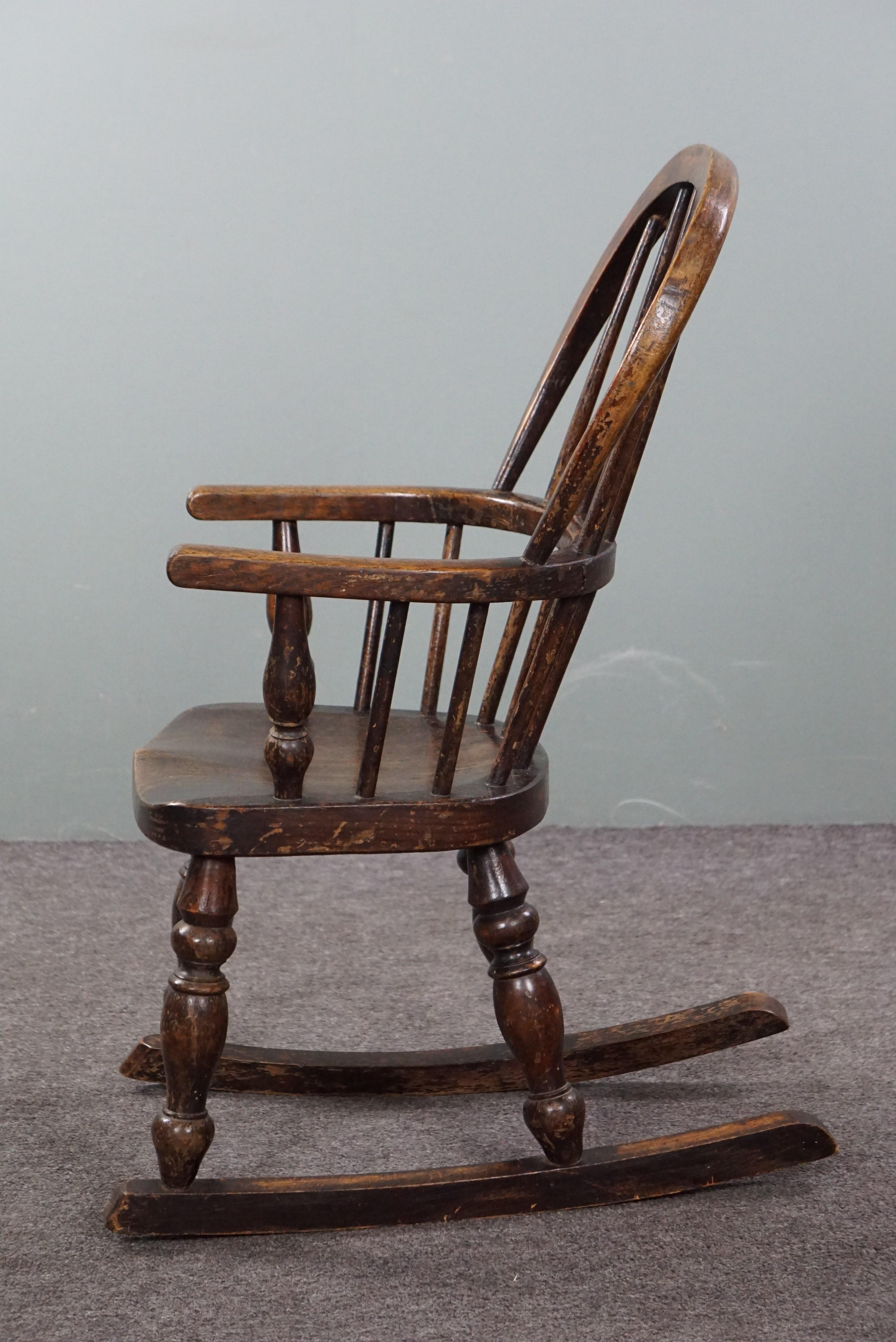 Mid-19th Century Antique Windsor child's rocking chair, around 1850 For Sale