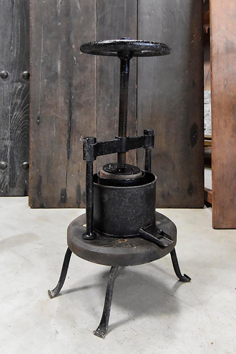 Nice antique wine press from the 19 century.
It is a very small model.
It is made partly from iron and wood.