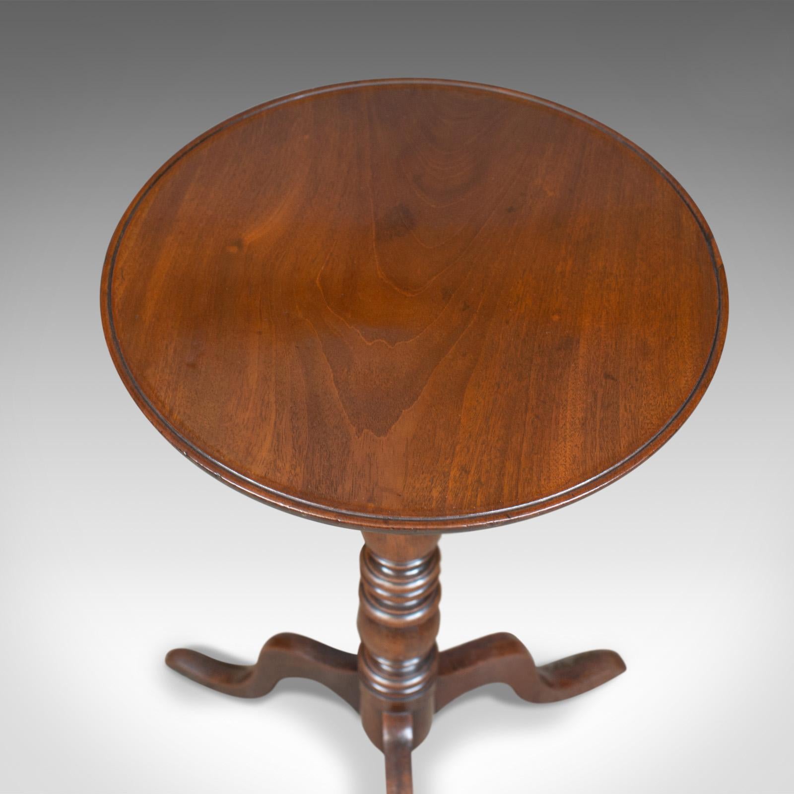 This is an antique wine table, a Victorian, circular, side table in mahogany dating to the mid-19th century, circa 1840.

Crafted in select stocks of quality mahogany
Good color and grain interest in a lustrous wax polished finish
Of quality