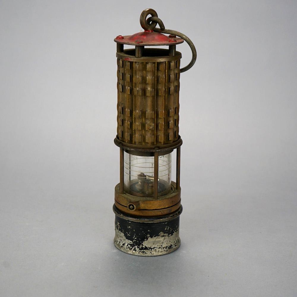 Antique wolf safety lamp of America Co. New York, Coal Miners Lamp, maker label as photographed, 19th C. 

Measures- 11.5''H x 3.5''W x 3.5''D.

Catalogue Note: Ask about DISCOUNTED DELIVERY RATES available to most regions within 1,500 miles of New