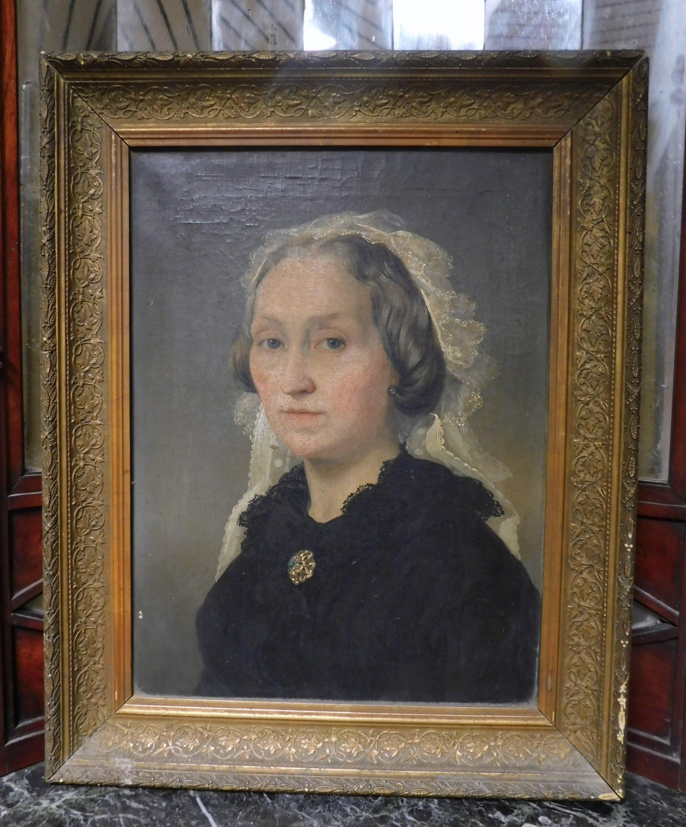 Antique oil painting on canvas, portrait of a lady with black dress, canvas with coeval sculpted and gilded frame, painted by an unknown artist in the 19th century, from Italy.