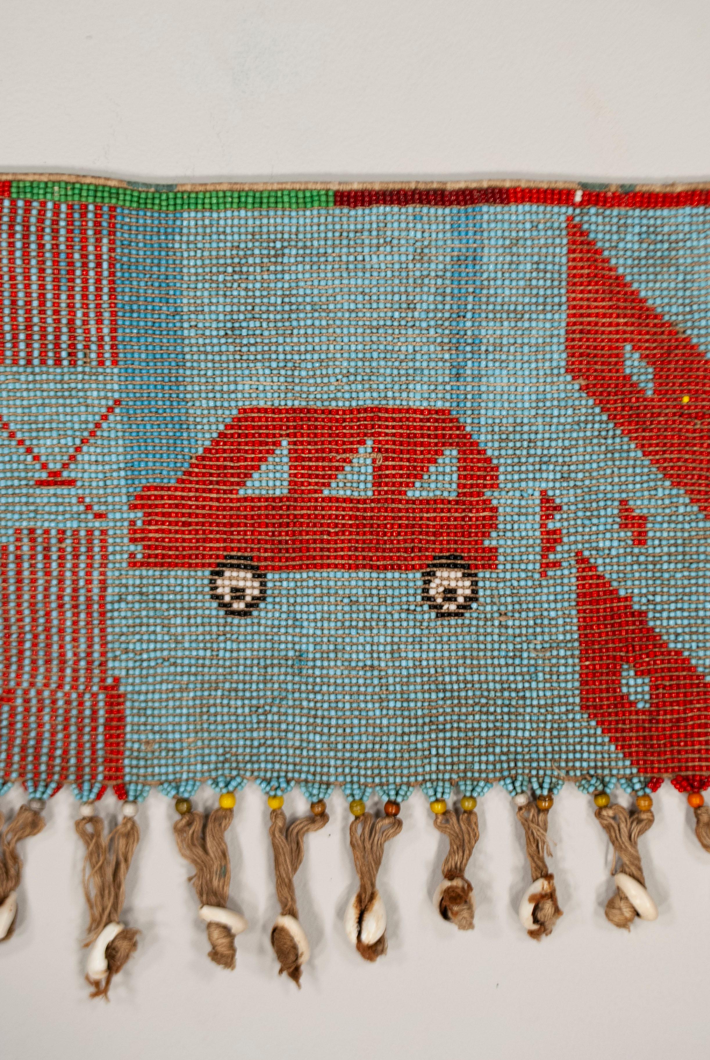 Antiguo caché-sexe (pikuran) ceremonial femenino de cuentas, Camerún Anudado a mano en venta