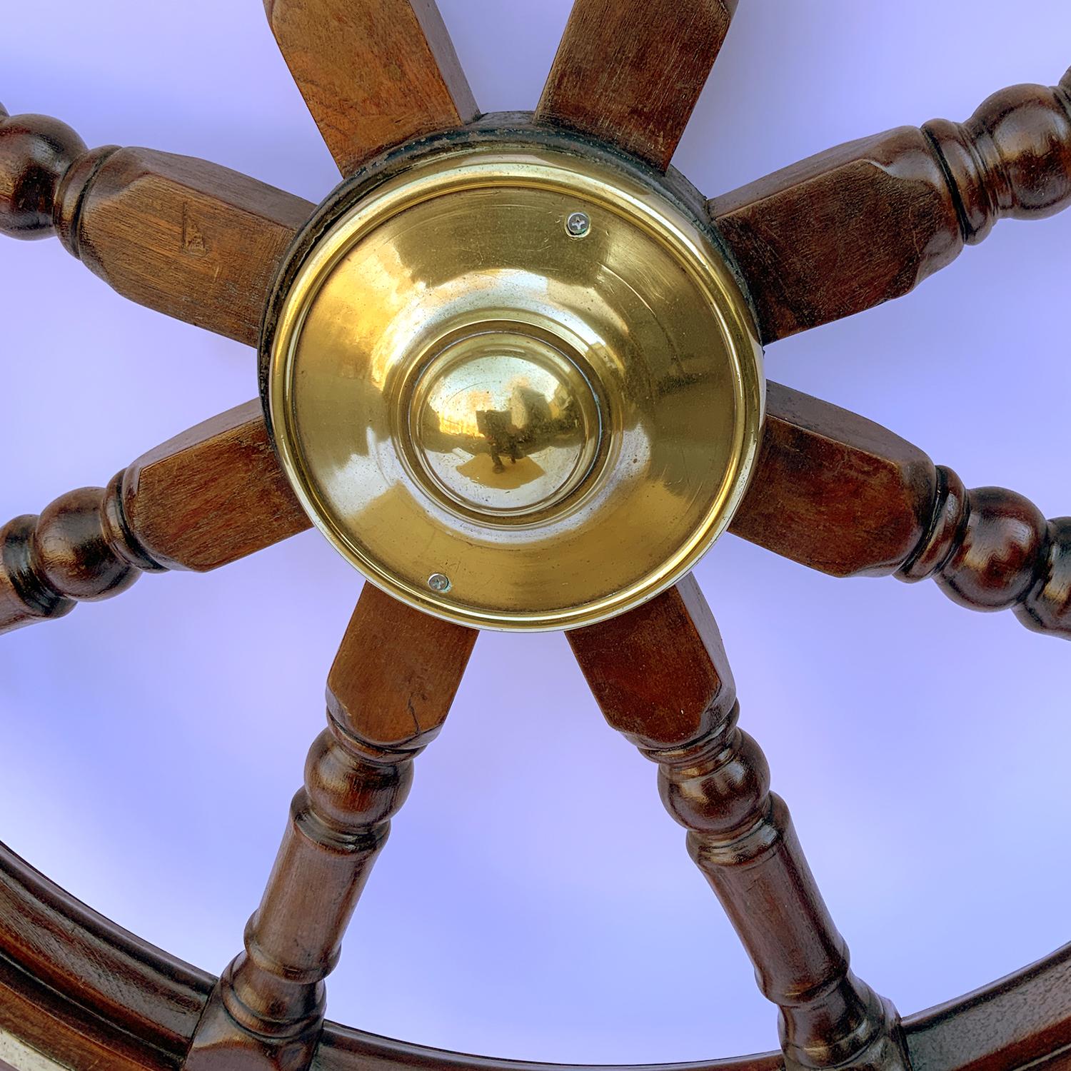 Lacquered Antique Wood and Brass Ship's Wheel For Sale