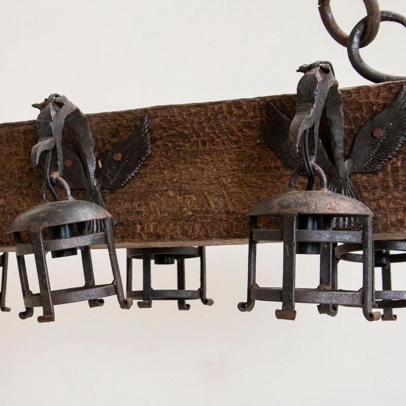 Antique Wood and Wrought Iron Horizontal Chandelier with Carved Gargoyle Heads 2